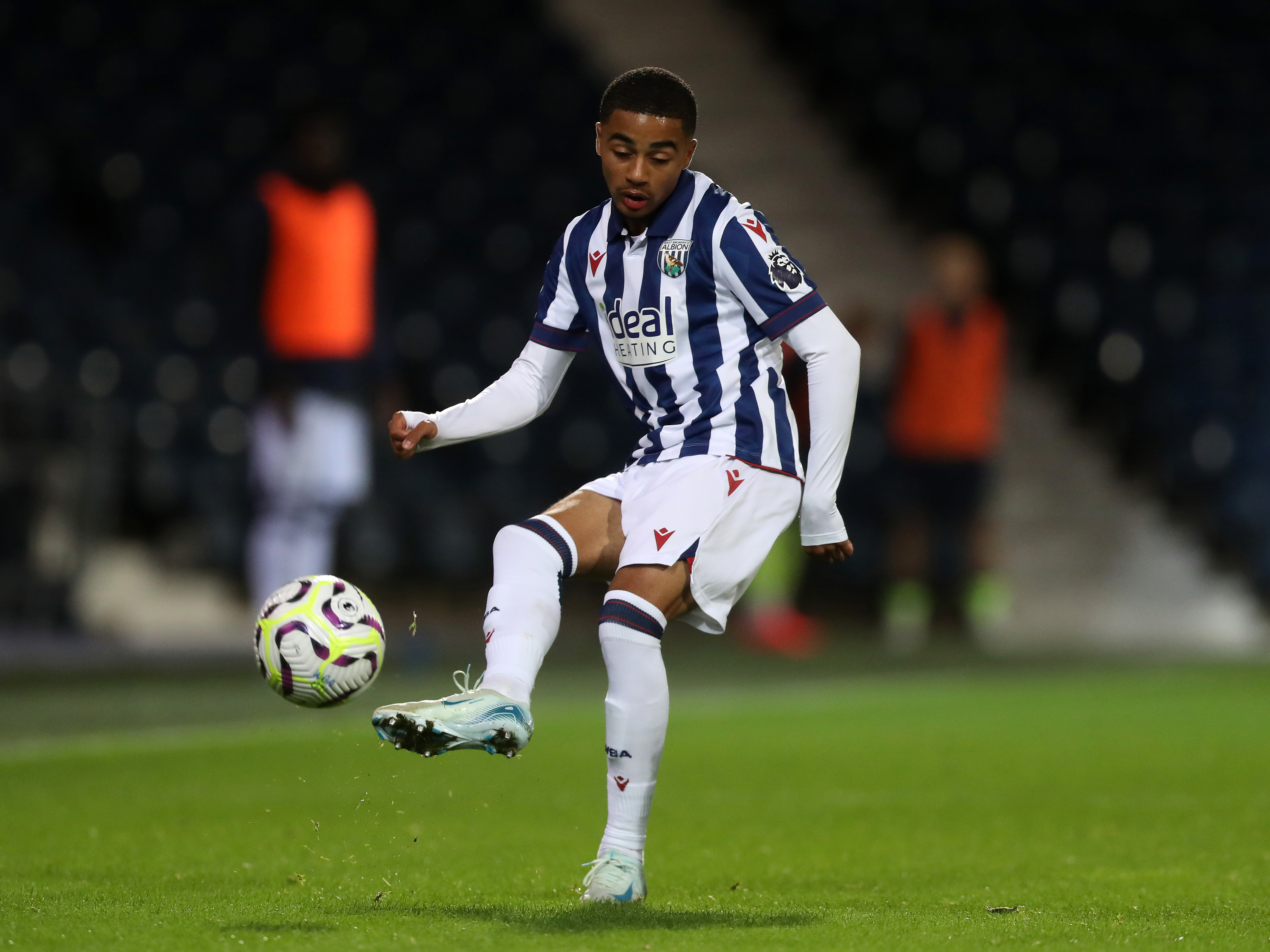 A photo of Albion U21 defender Deago Nelson in the 2024/25 home kit