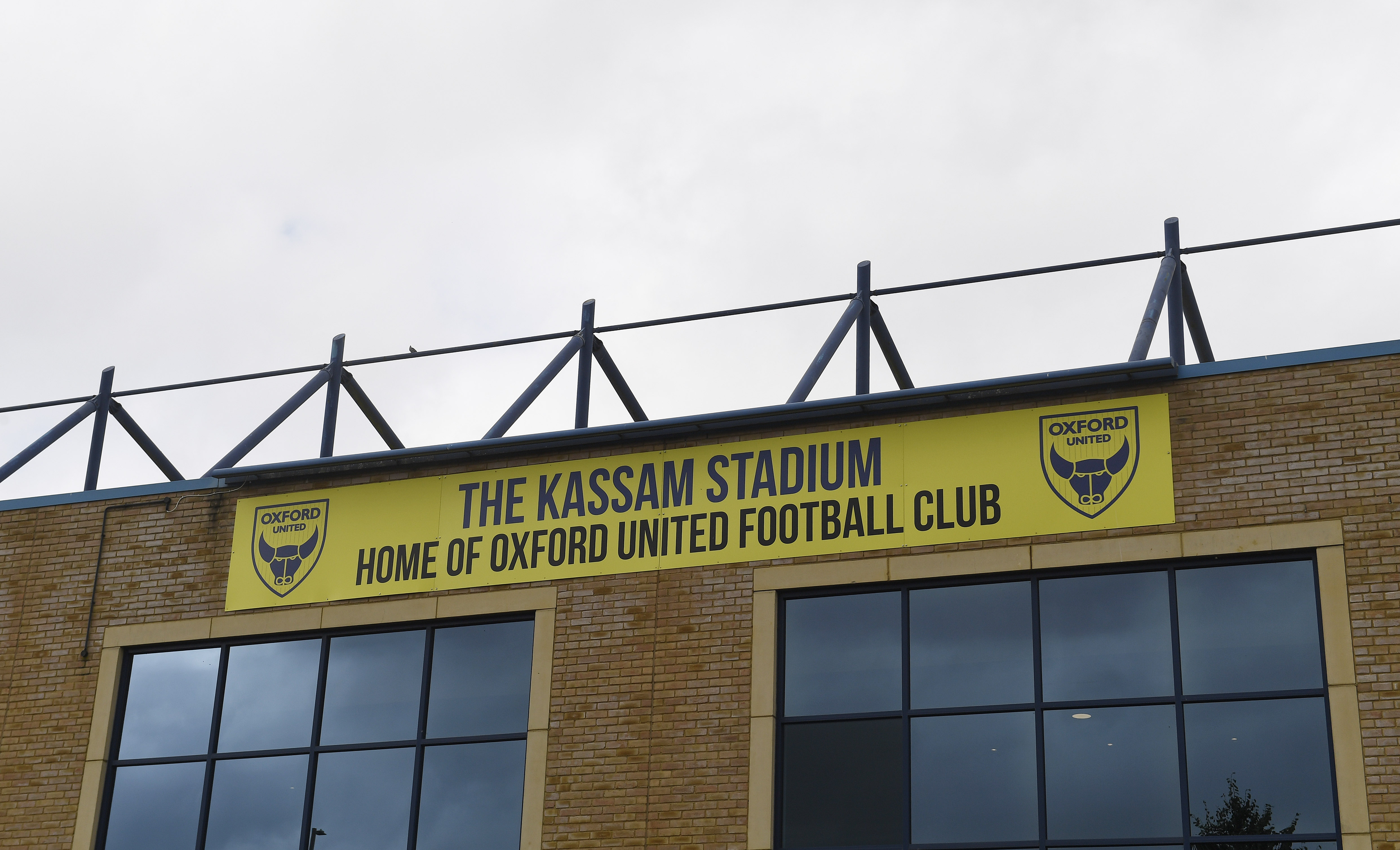 A general view of the outside of the Kassam Stadium with a banner detailing the name of the ground 