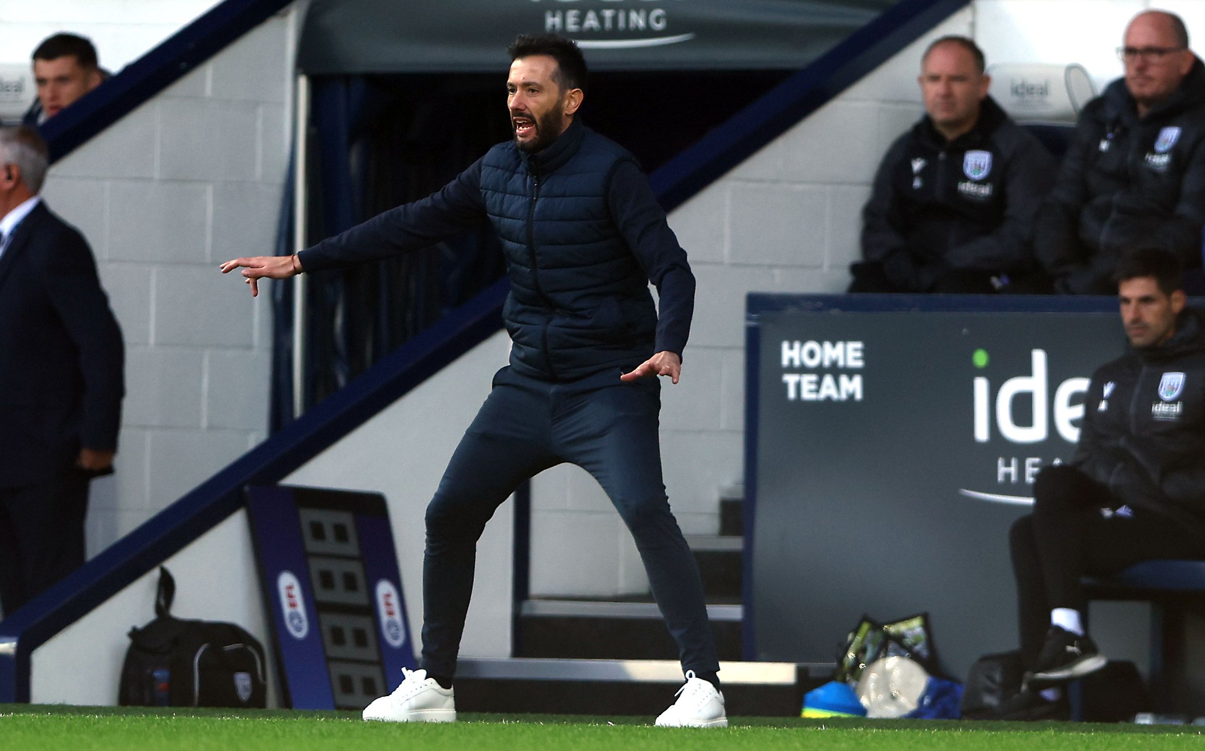 Carlos Coberán on the sidelines at The Hawthorns during a game