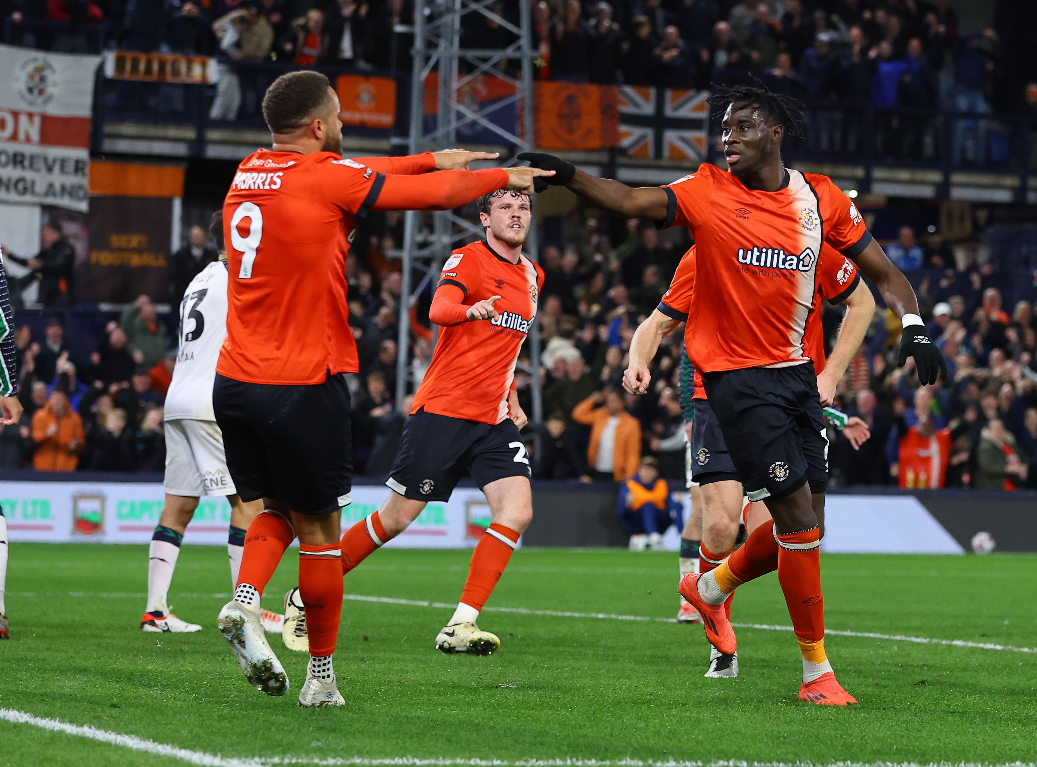 Luton Town players celebrate after scoring a goal against Sunderland 