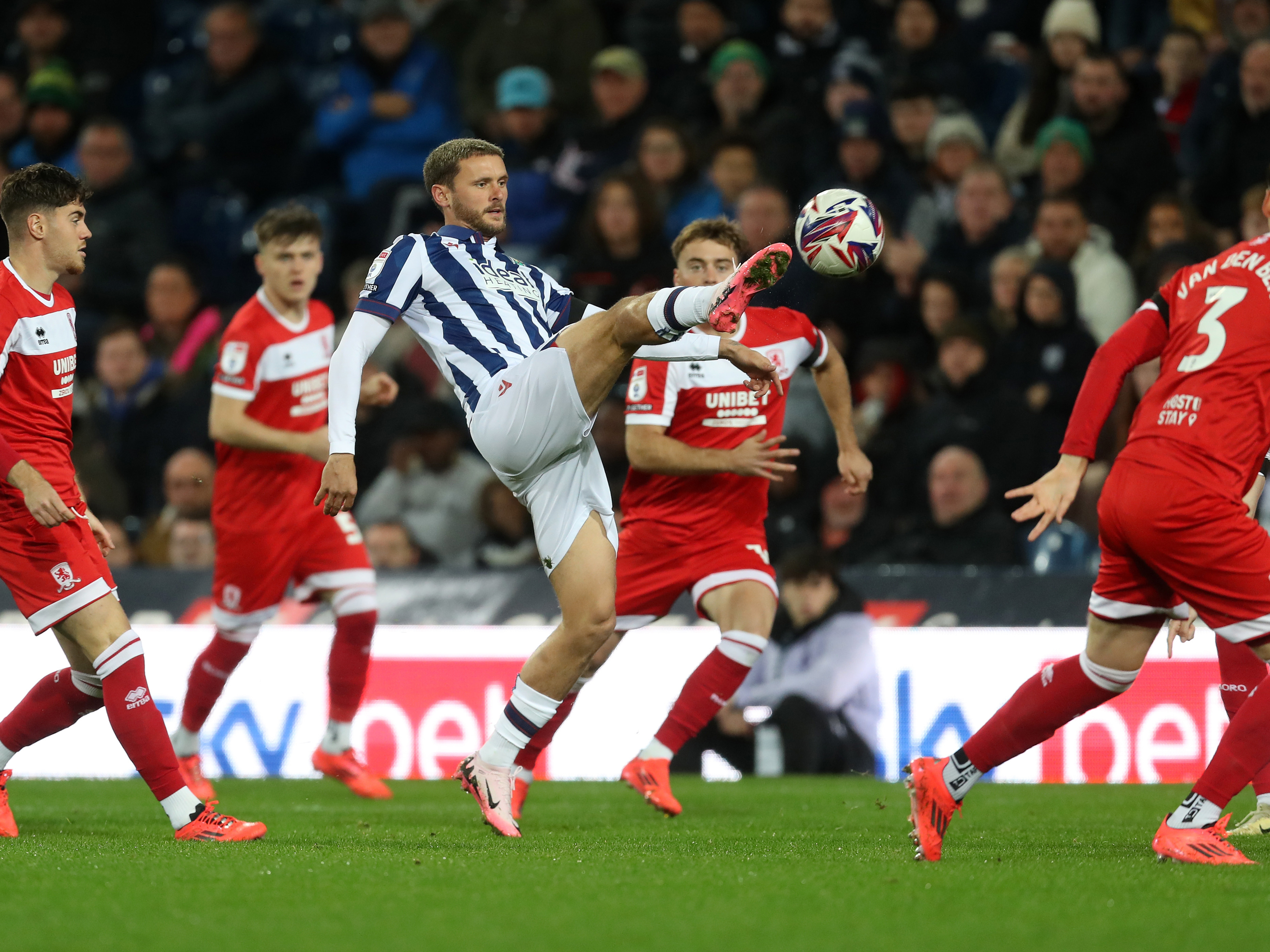 An image of John Swift passing the ball against Middlesbrough