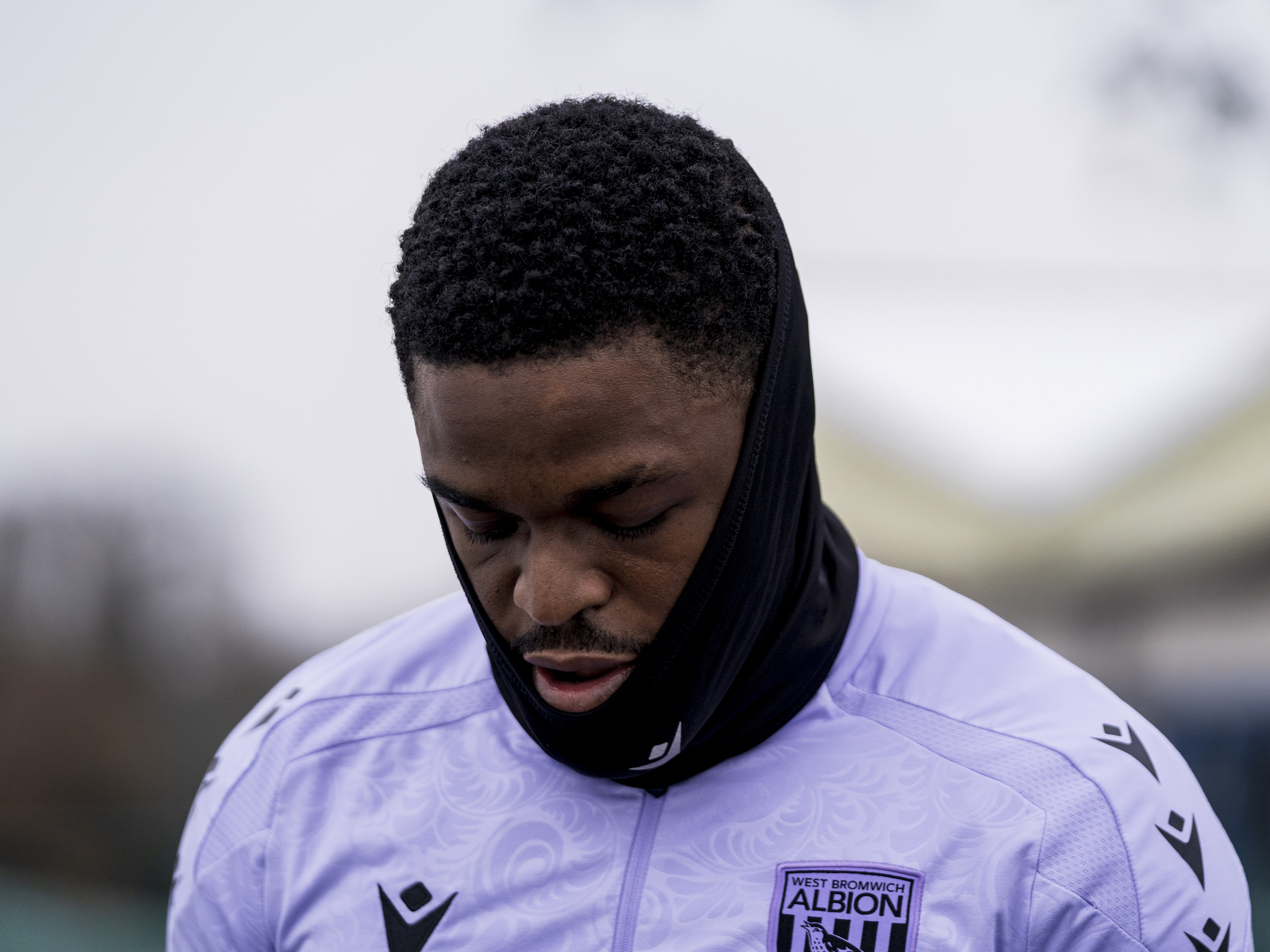 Josh Maja heading out to training wearing a snood