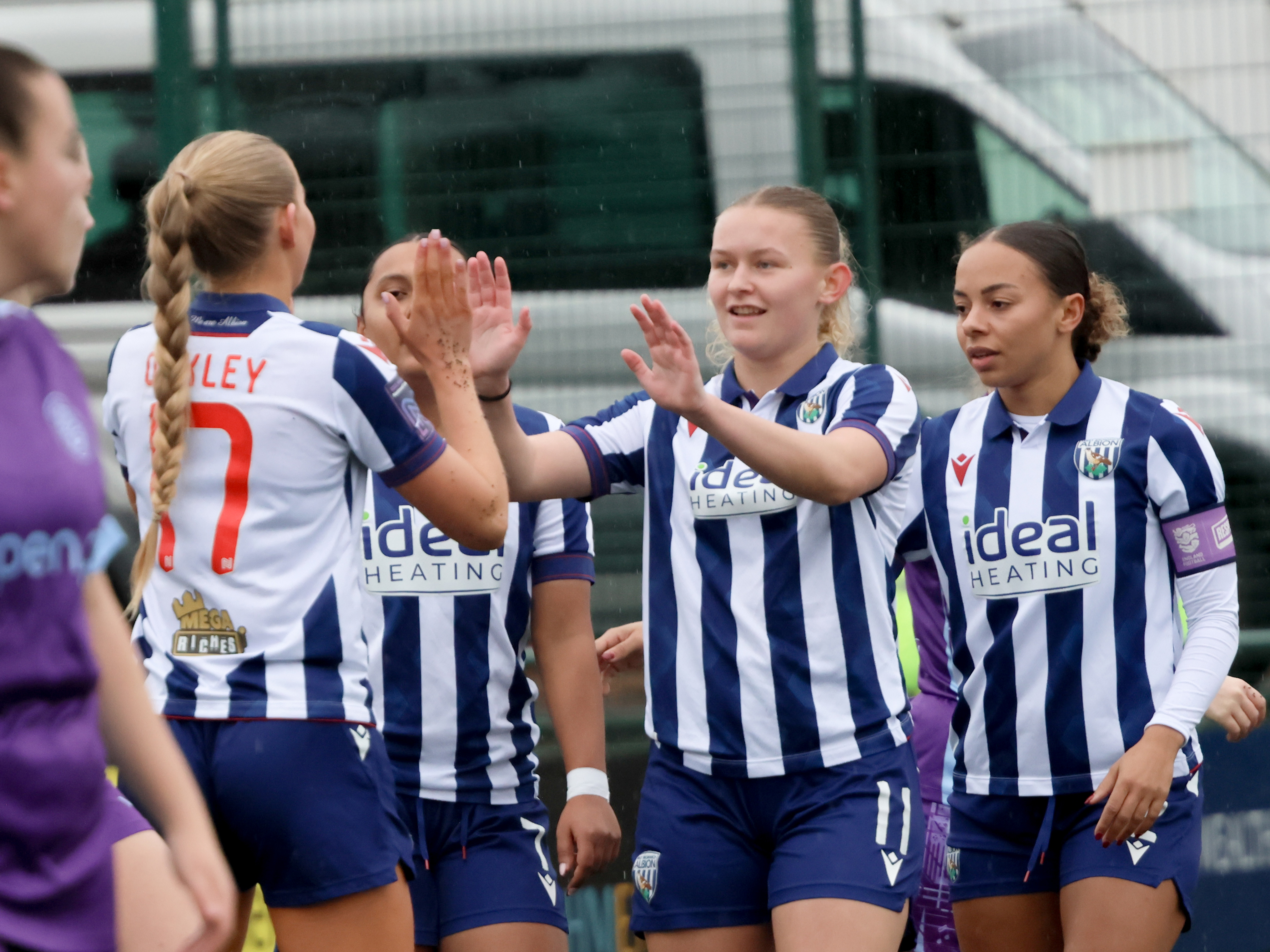 An image of Rhianne Oakley and Marli Rhodes-Andrews celebrating a goal against Worcester