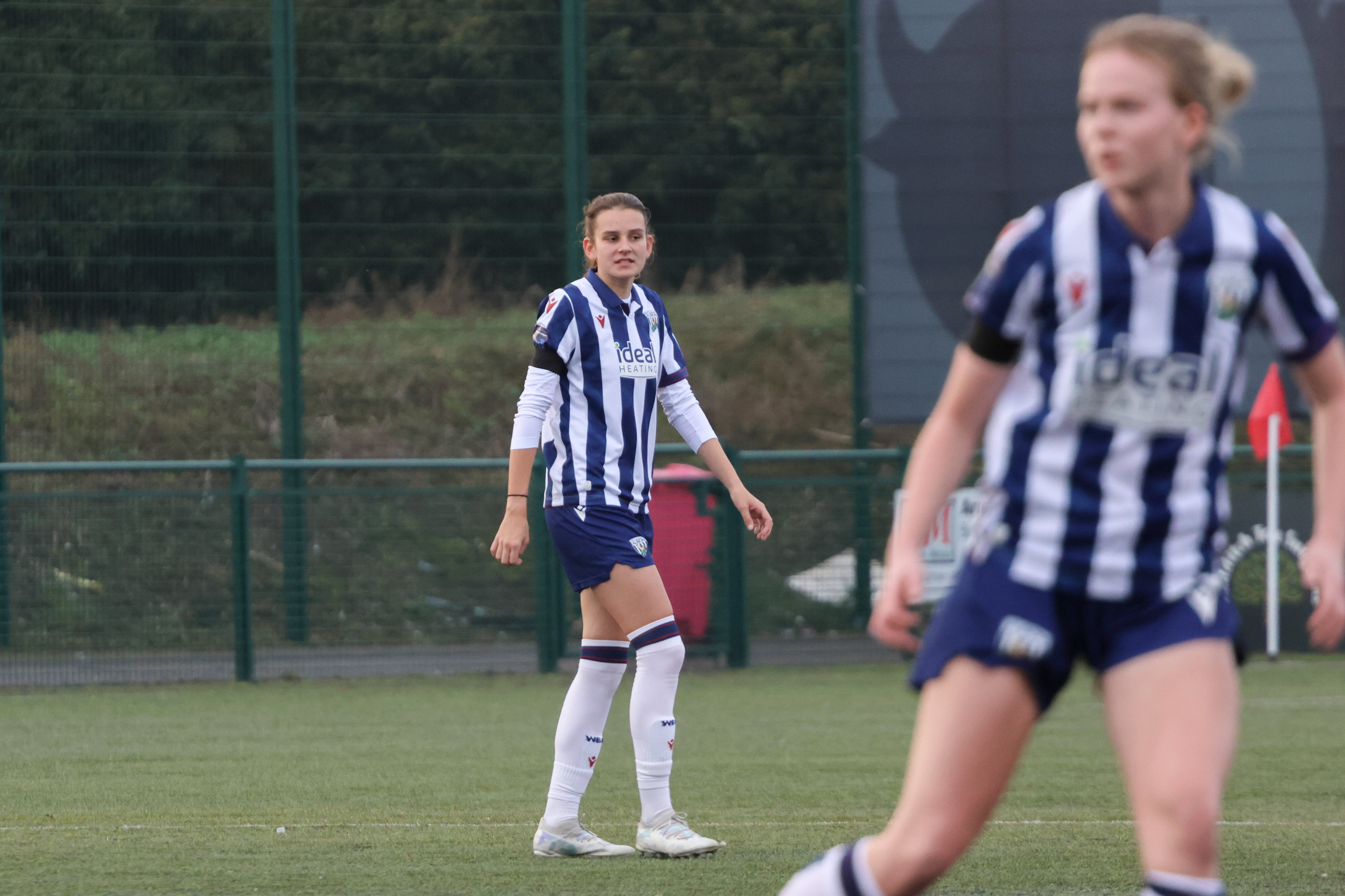 Izzy Green in action for WBA Women in the home kit