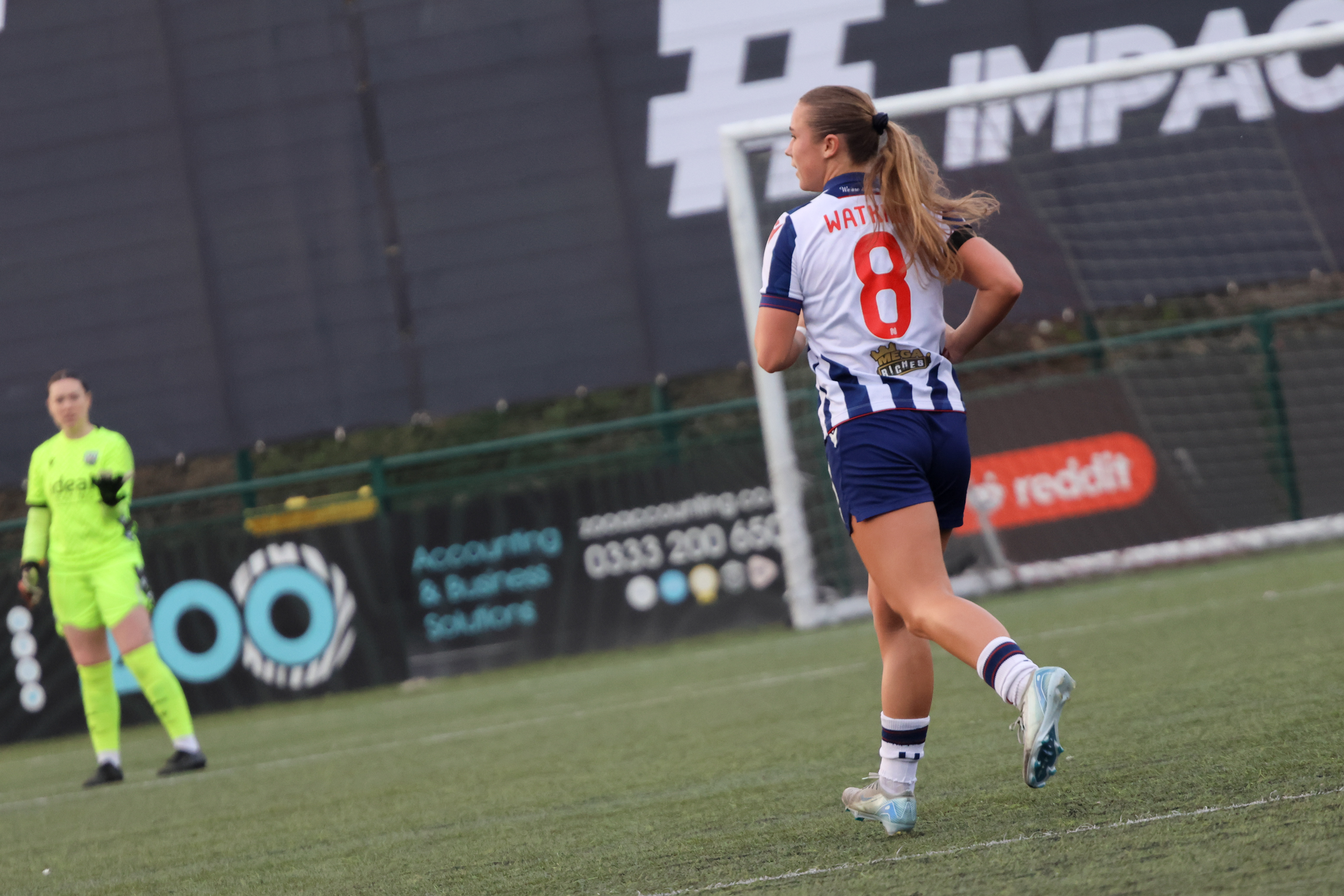 Seren Watkins in action for Albion Women wearing the home kit 