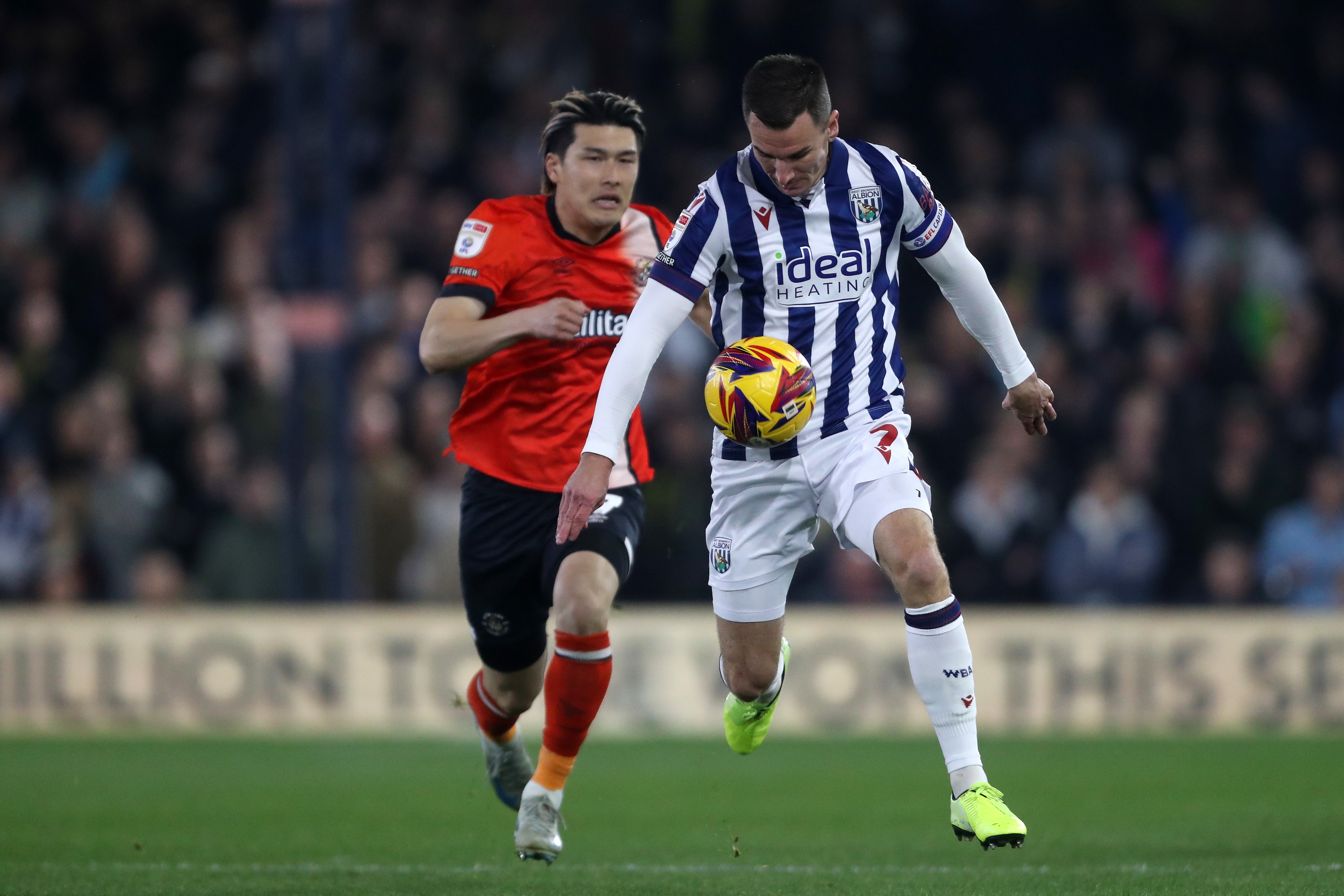 Jed Wallace running with the ball at Luton 