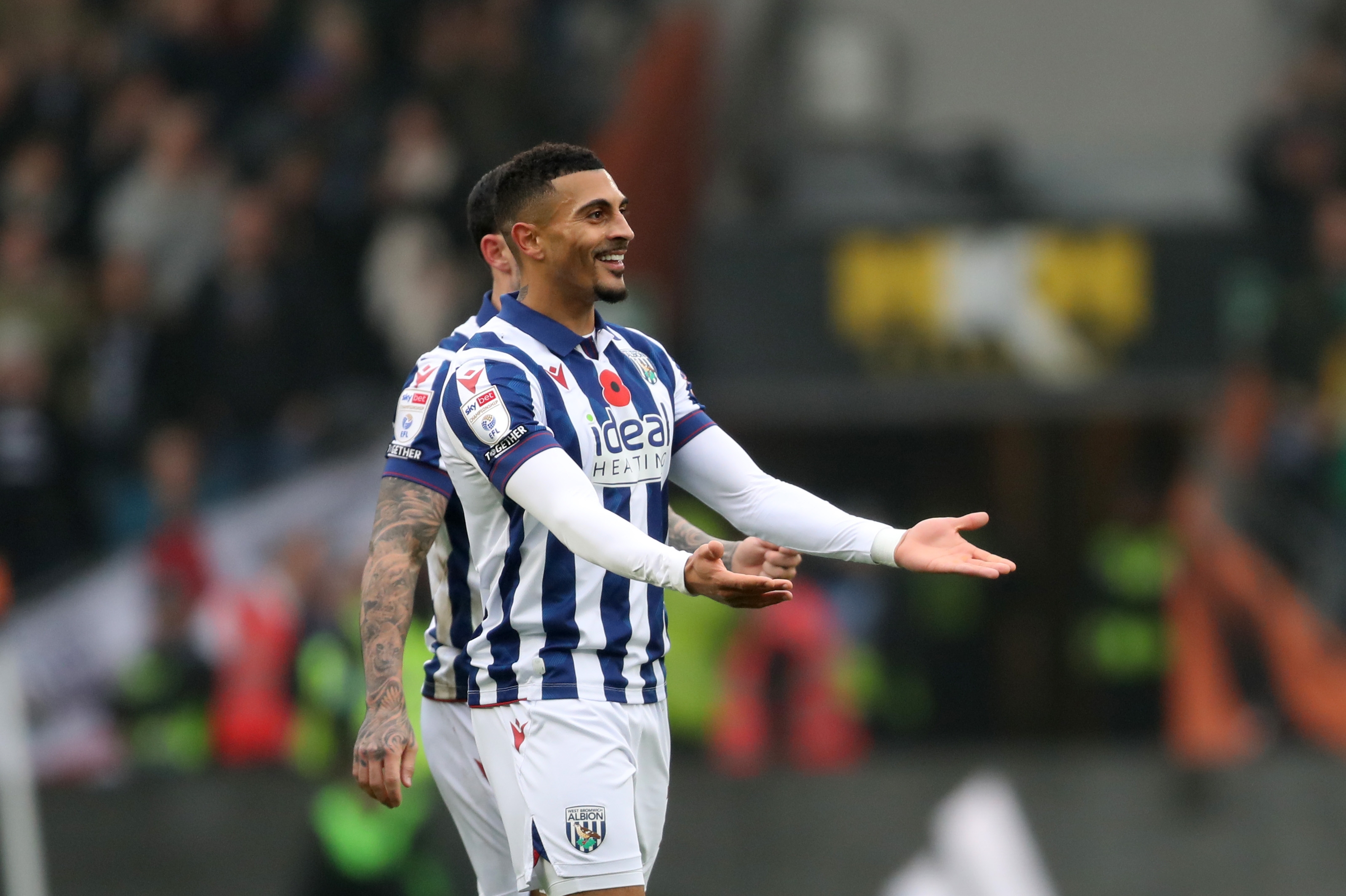 Karlan Grant celebrates scoring against Hull City 