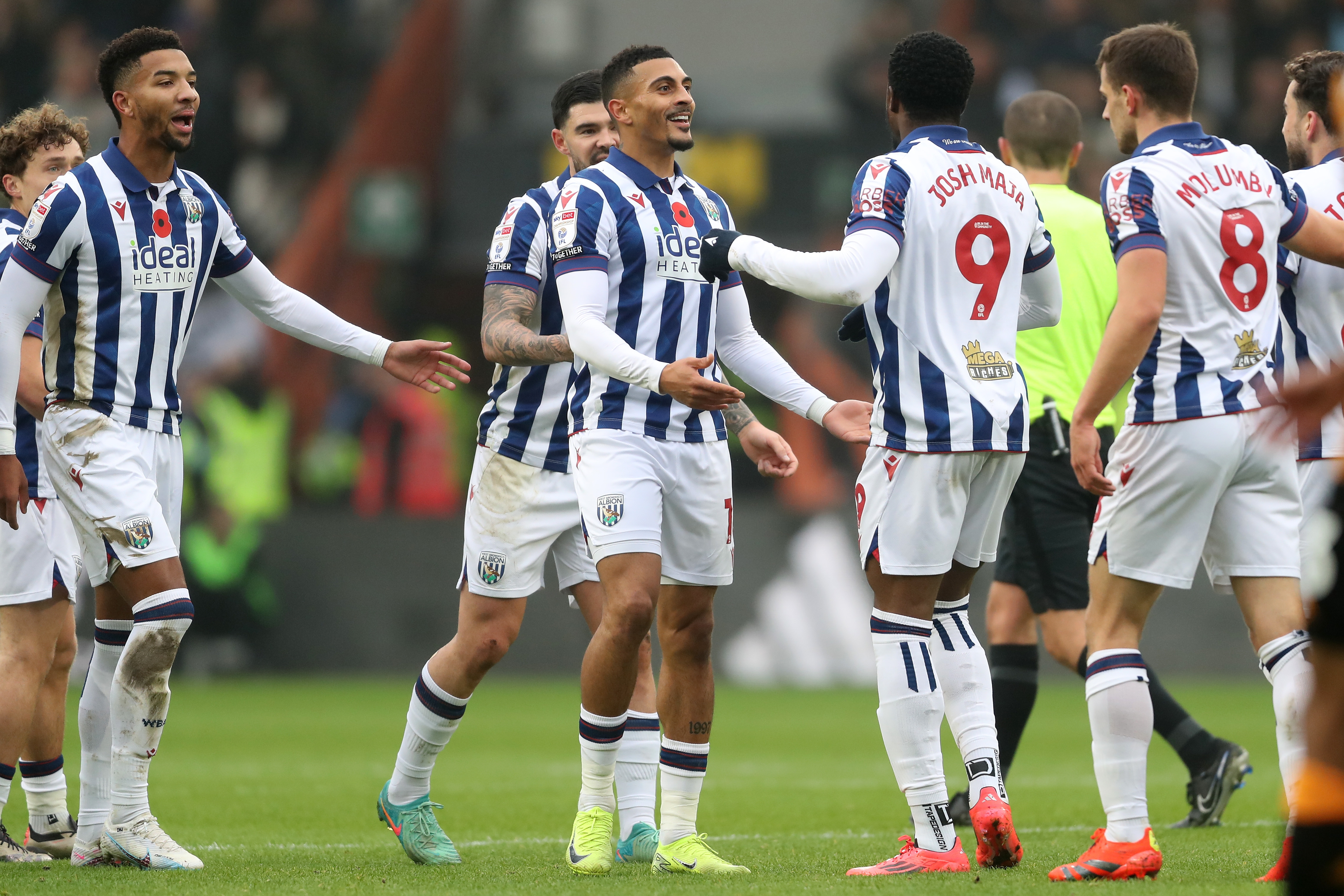 Karlan Grant celebrates scoring against Hull City with team-mates