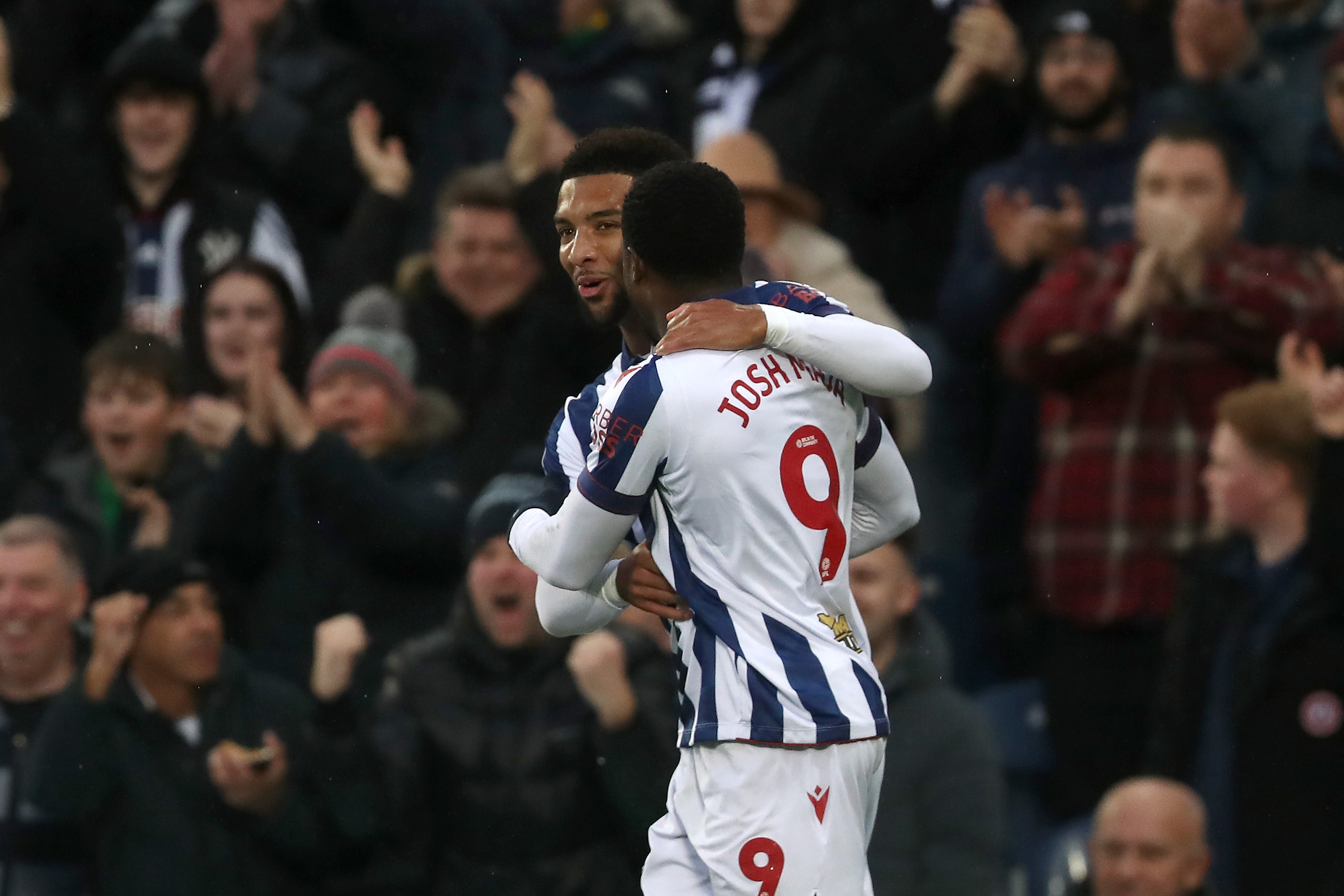 Mason Holgate celebrates scoring against Norwich City with Josh Maja