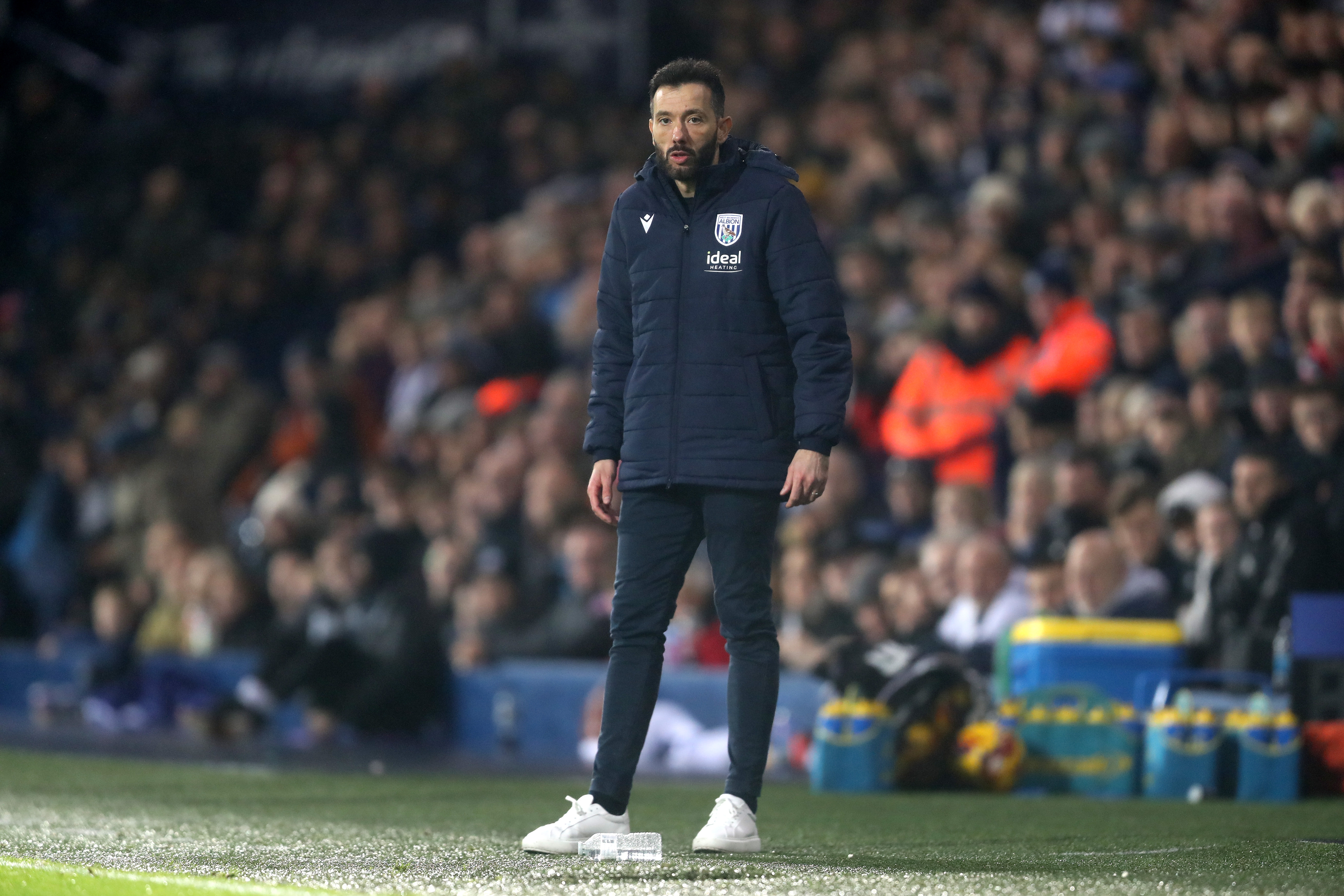 Carlos Corberán watching the Norwich game at the side of the pitch at The Hawthorns 