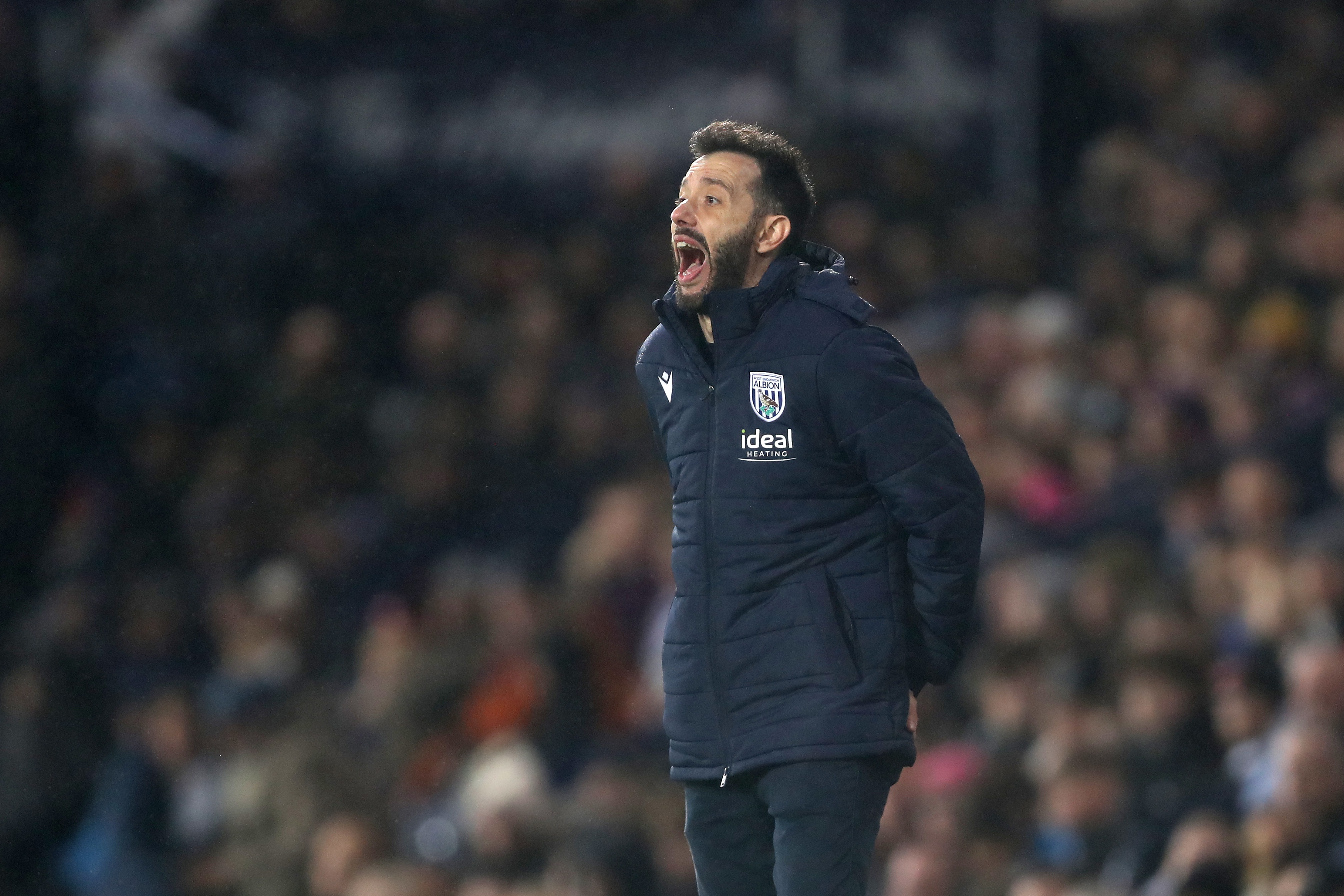 Carlos Corberán shouting at players on the side of the pitch at The Hawthorns 