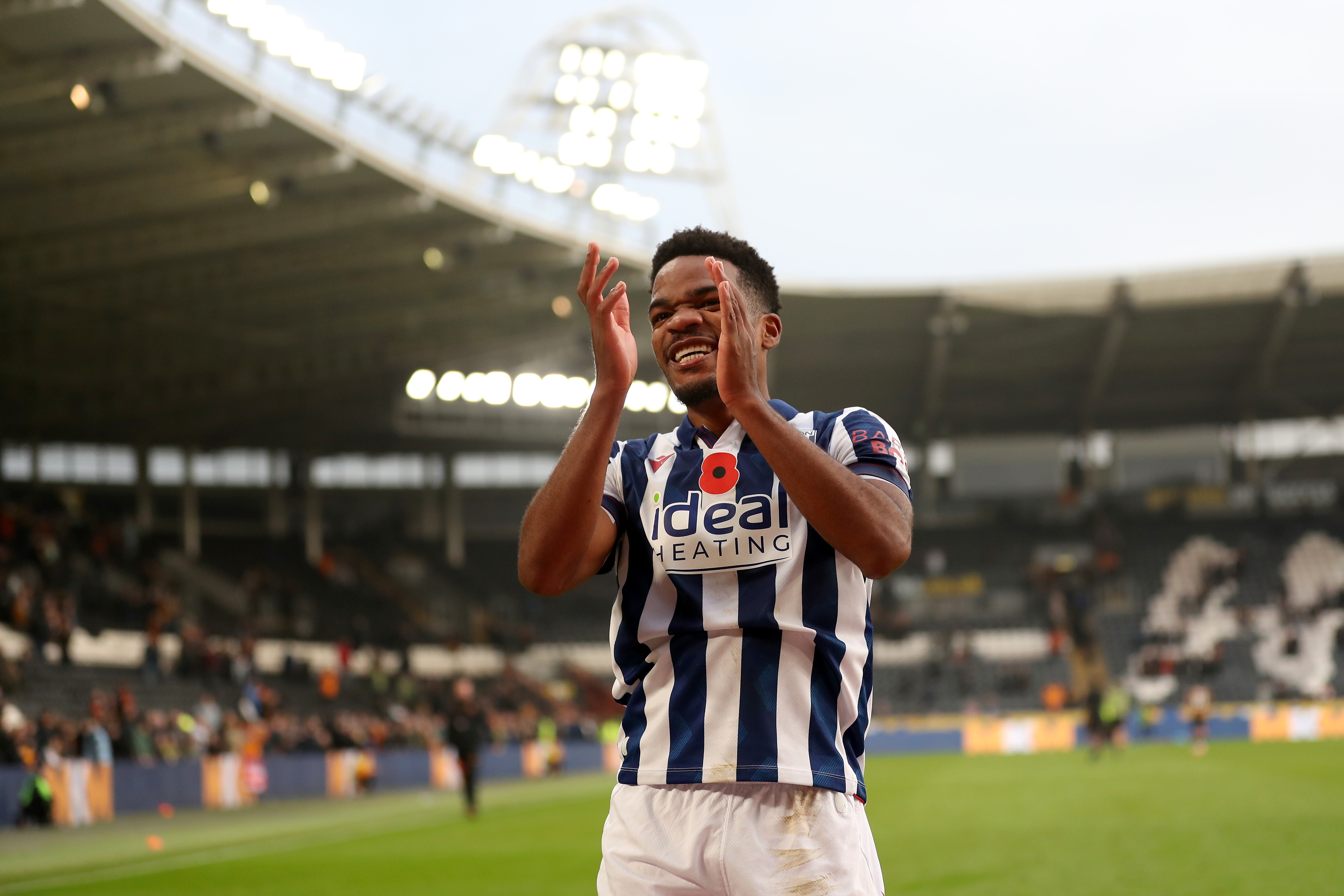 Grady Diangana celebrates a win after the full-time whistle