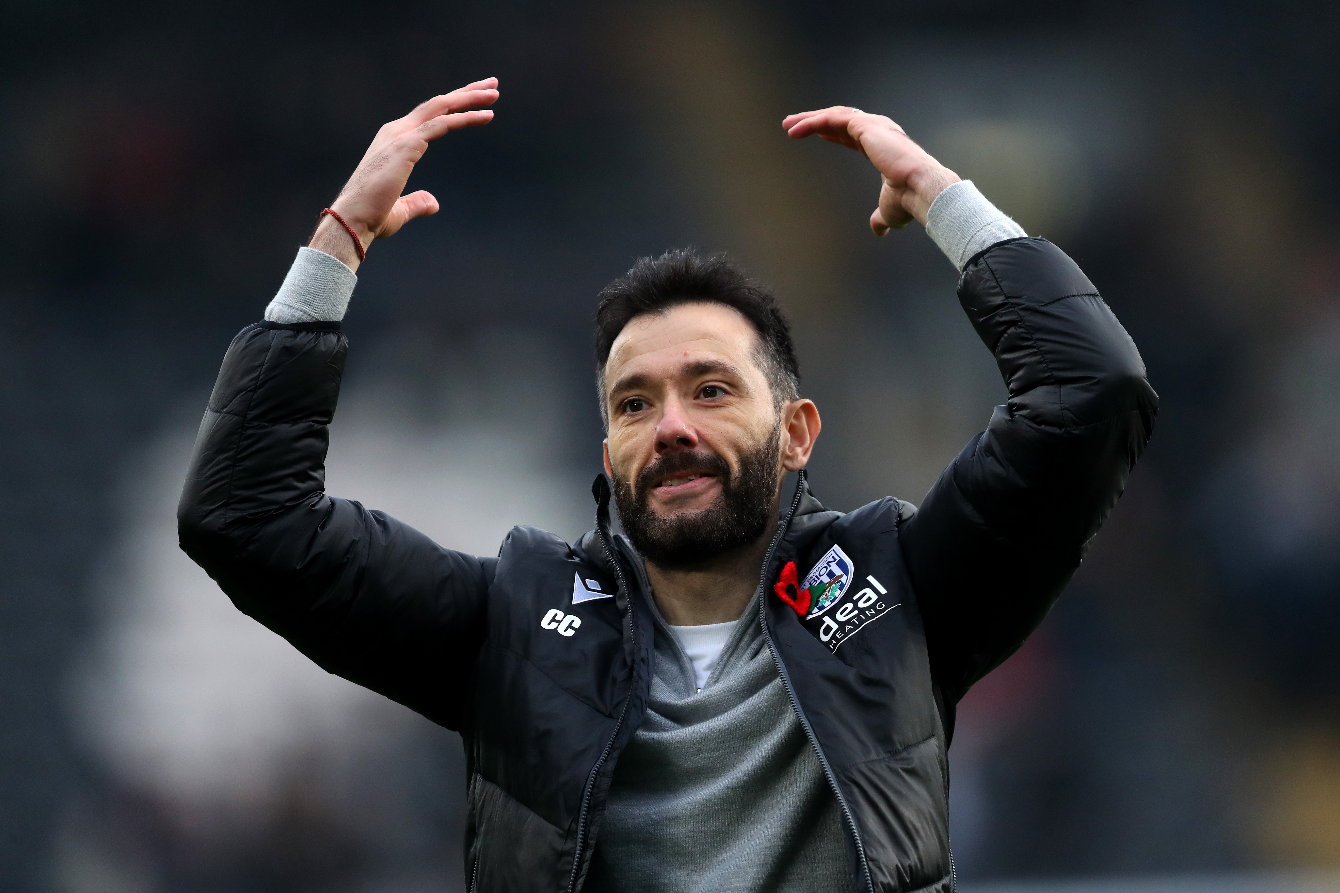 Carlos Corberán celebrates a win after the full-time whistle