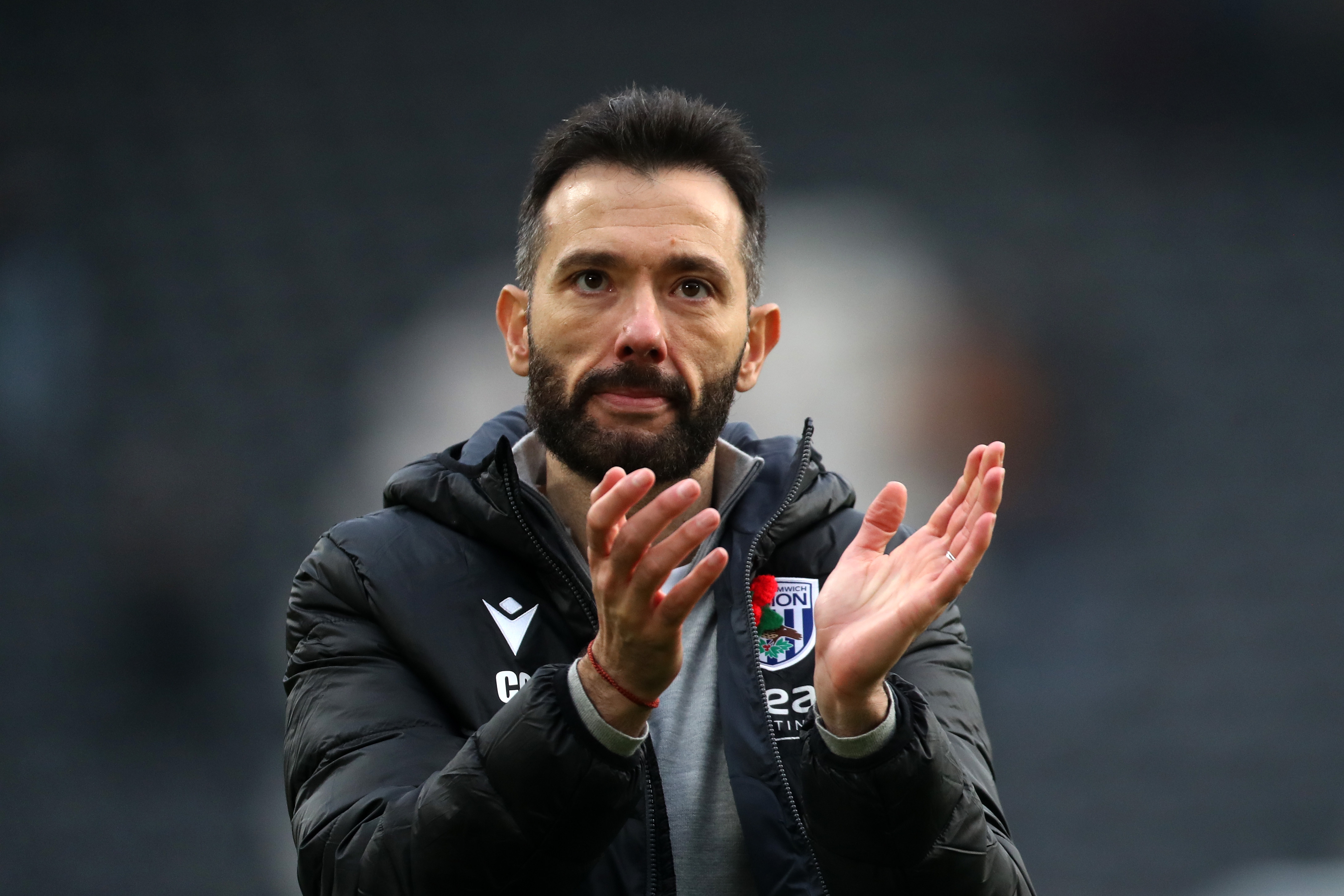 Carlos Corberán applauds Albion fans at Hull