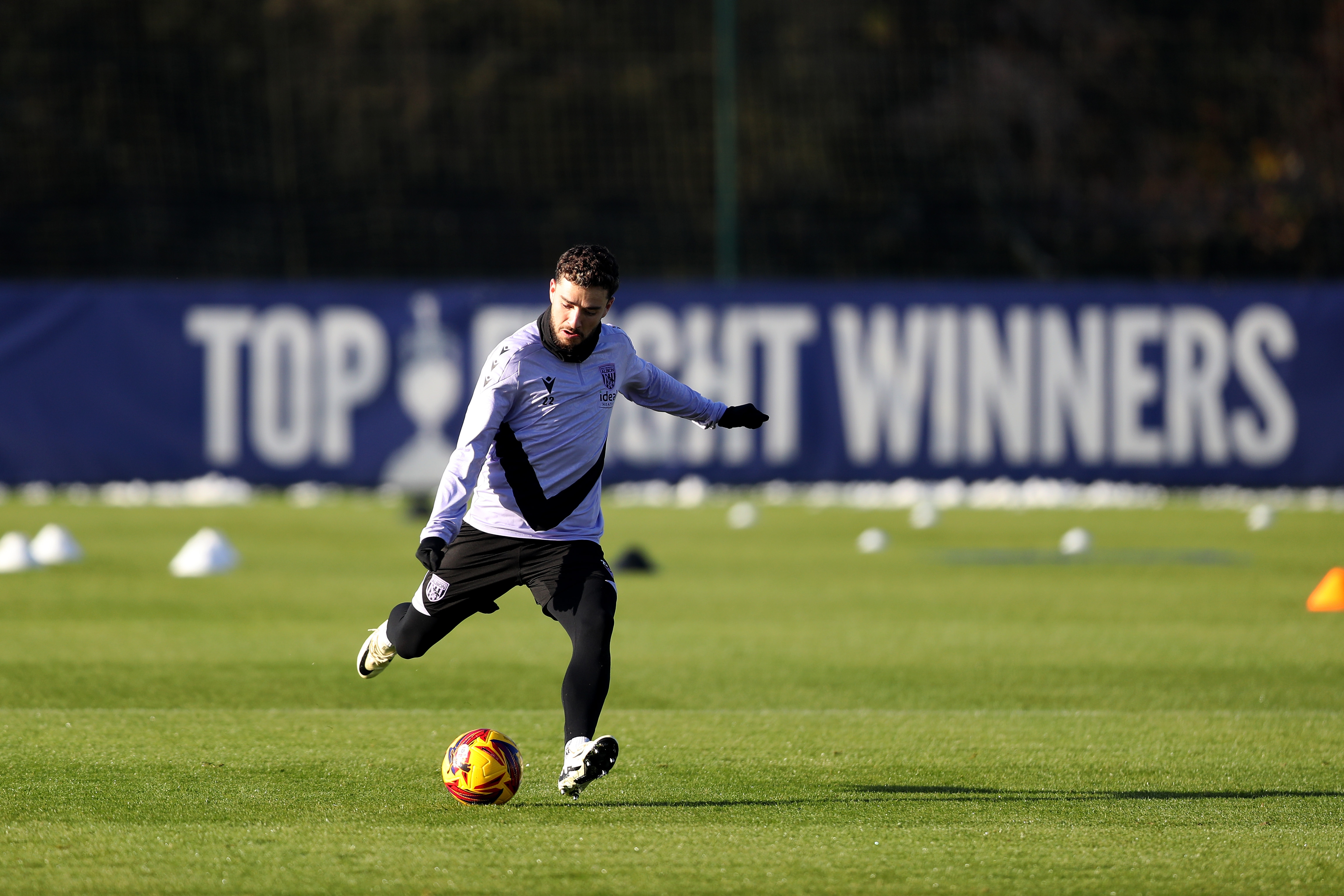 Mikey Johnston on the ball during a training session 