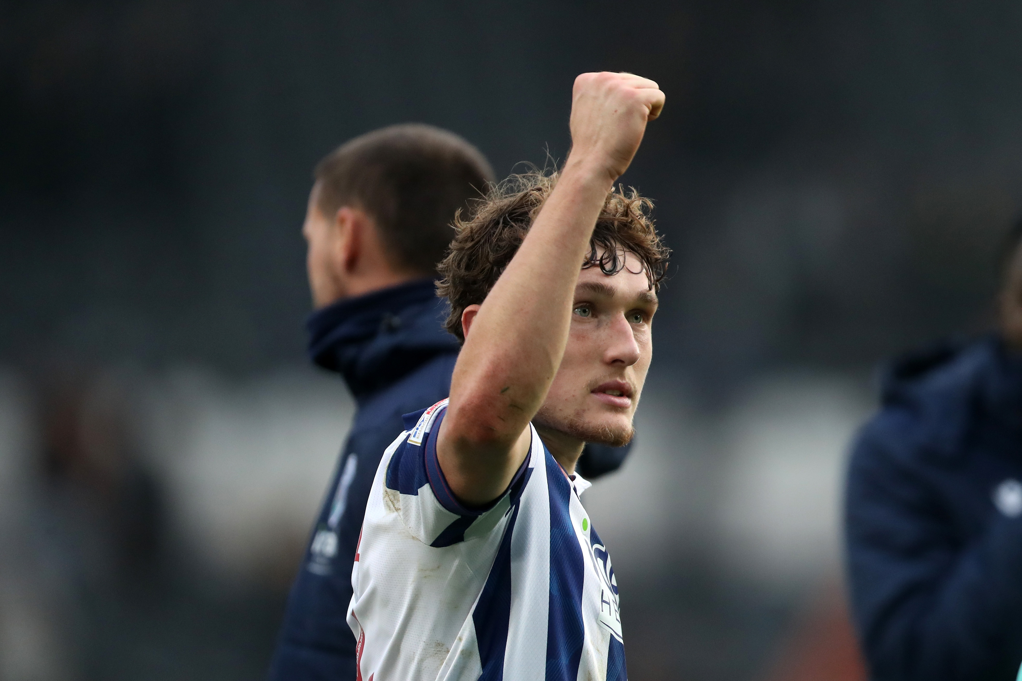 Callum Styles celebrates a win after the full-time whistle