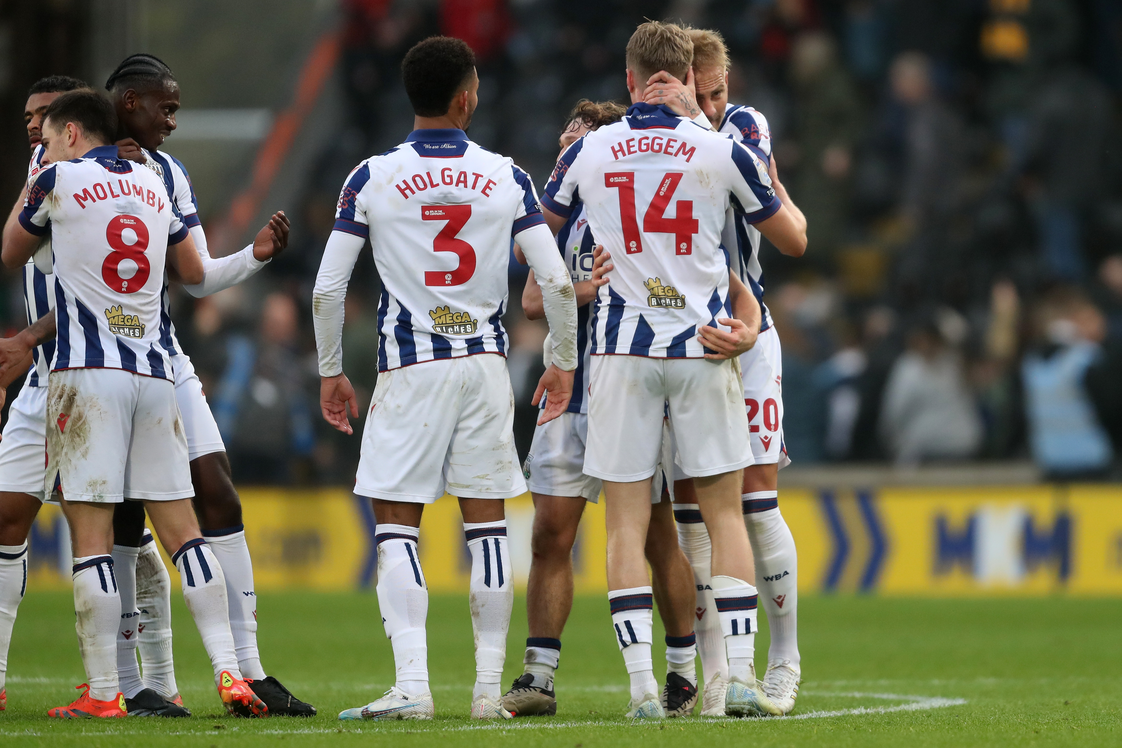 Several Albion players Grady Diangana celebrate a win after the full-time whistle