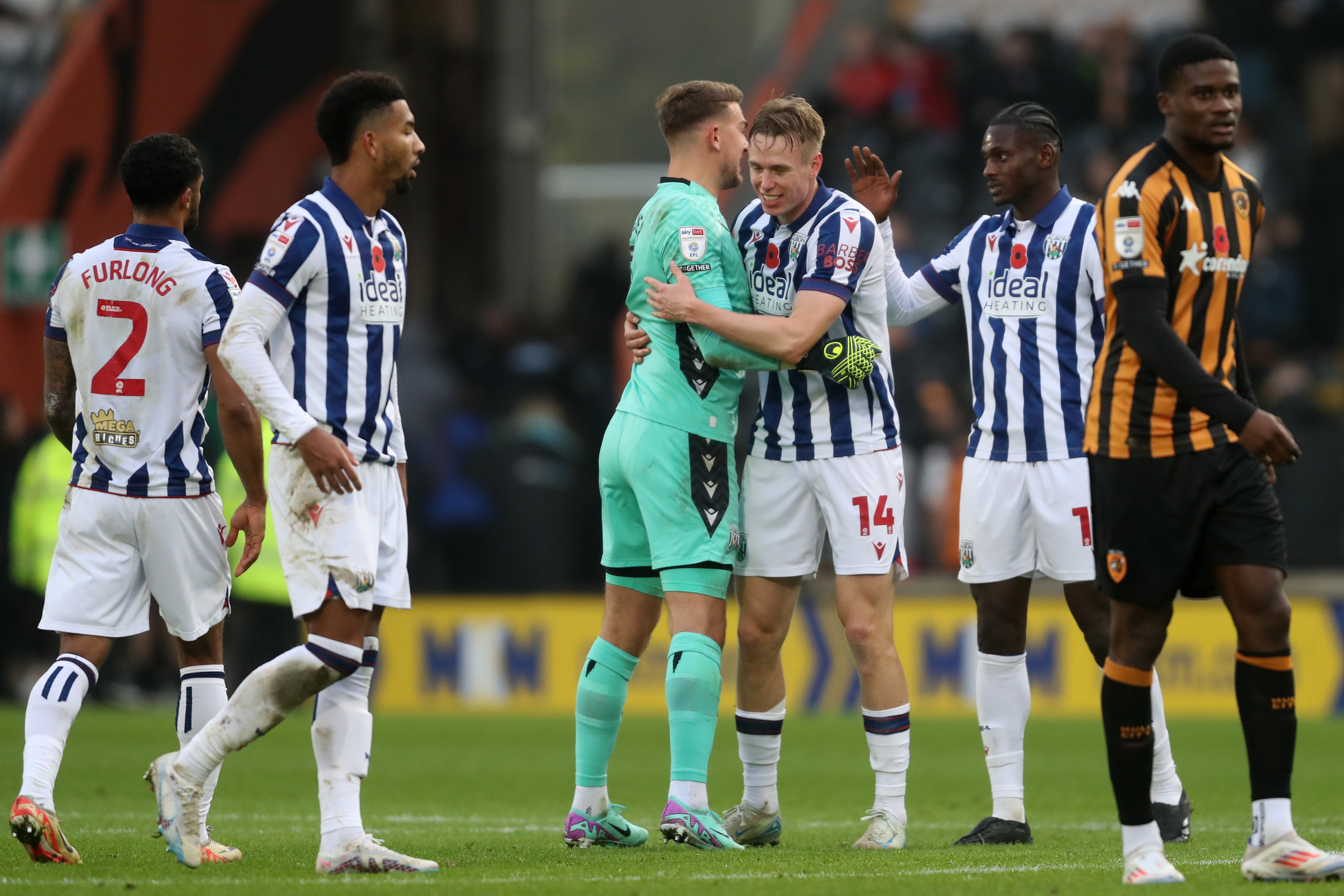 Several Albion players Grady Diangana celebrate a win after the full-time whistle