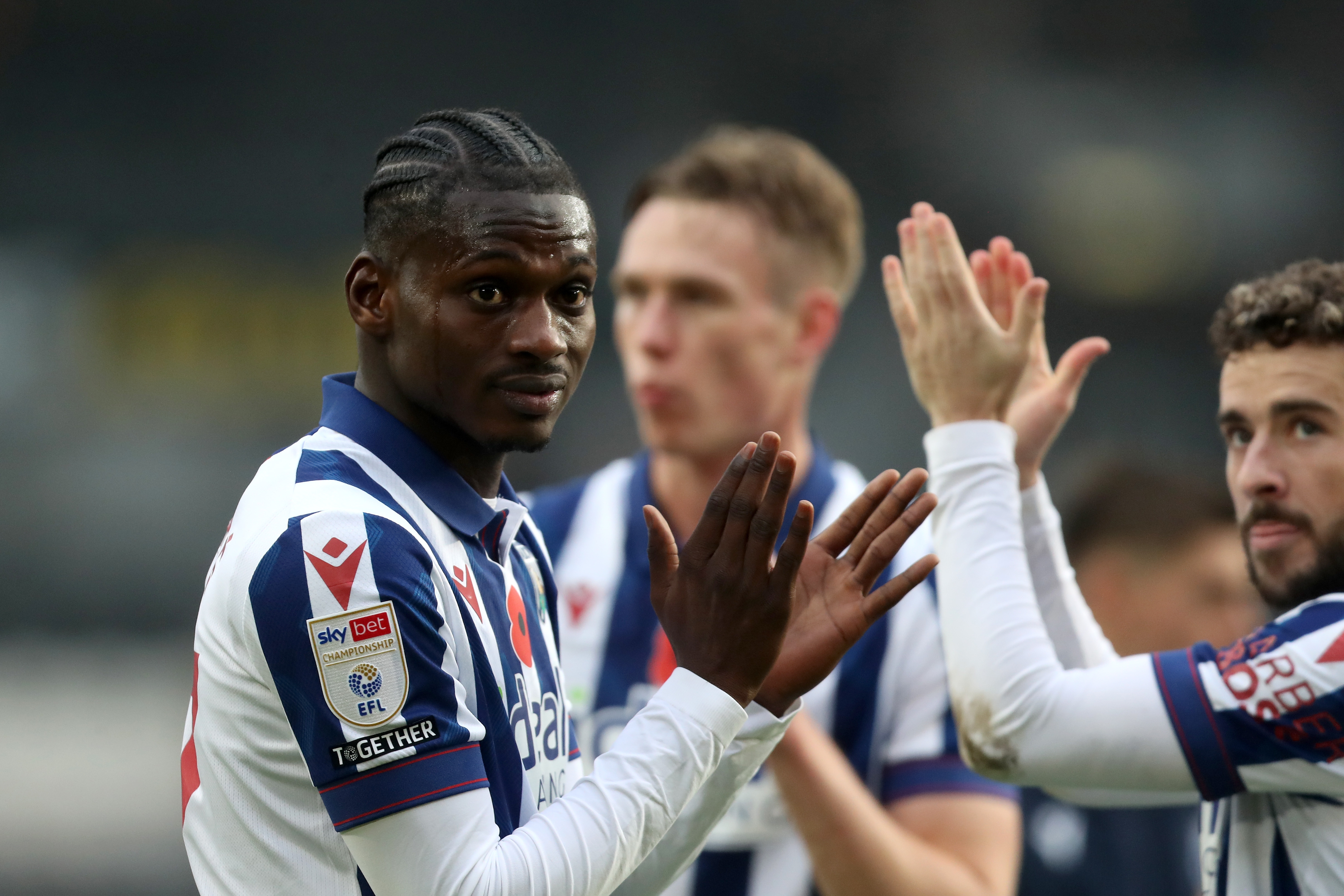 Ousmane Diakité applauds Albion fans at full-time at Hull