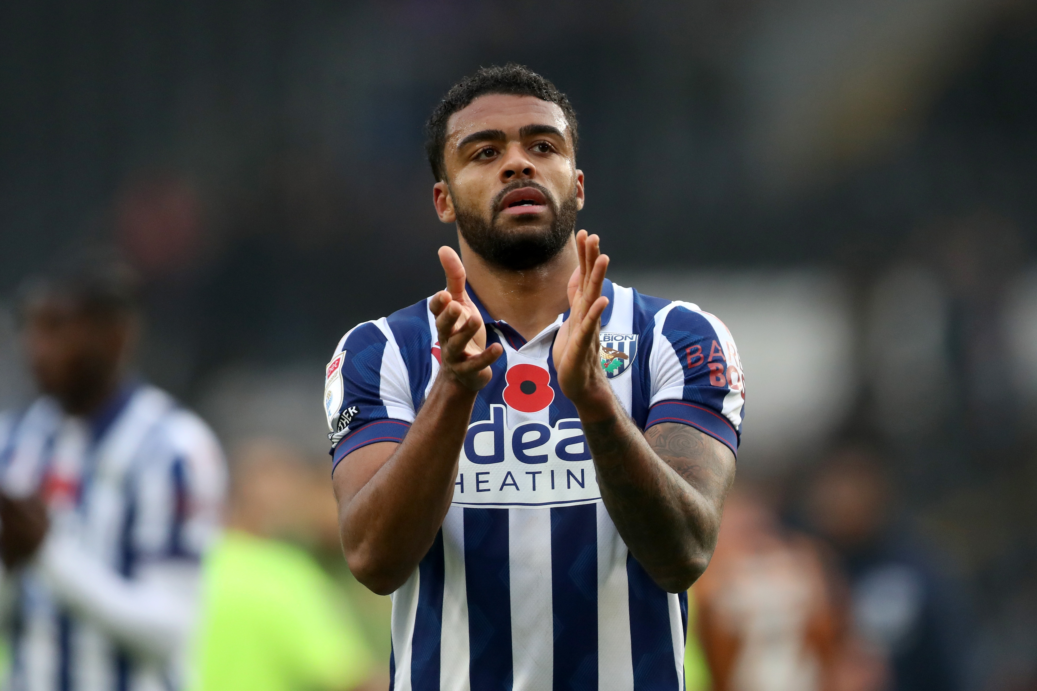 Darnell Furlong applauds Albion fans at full-time at Hull