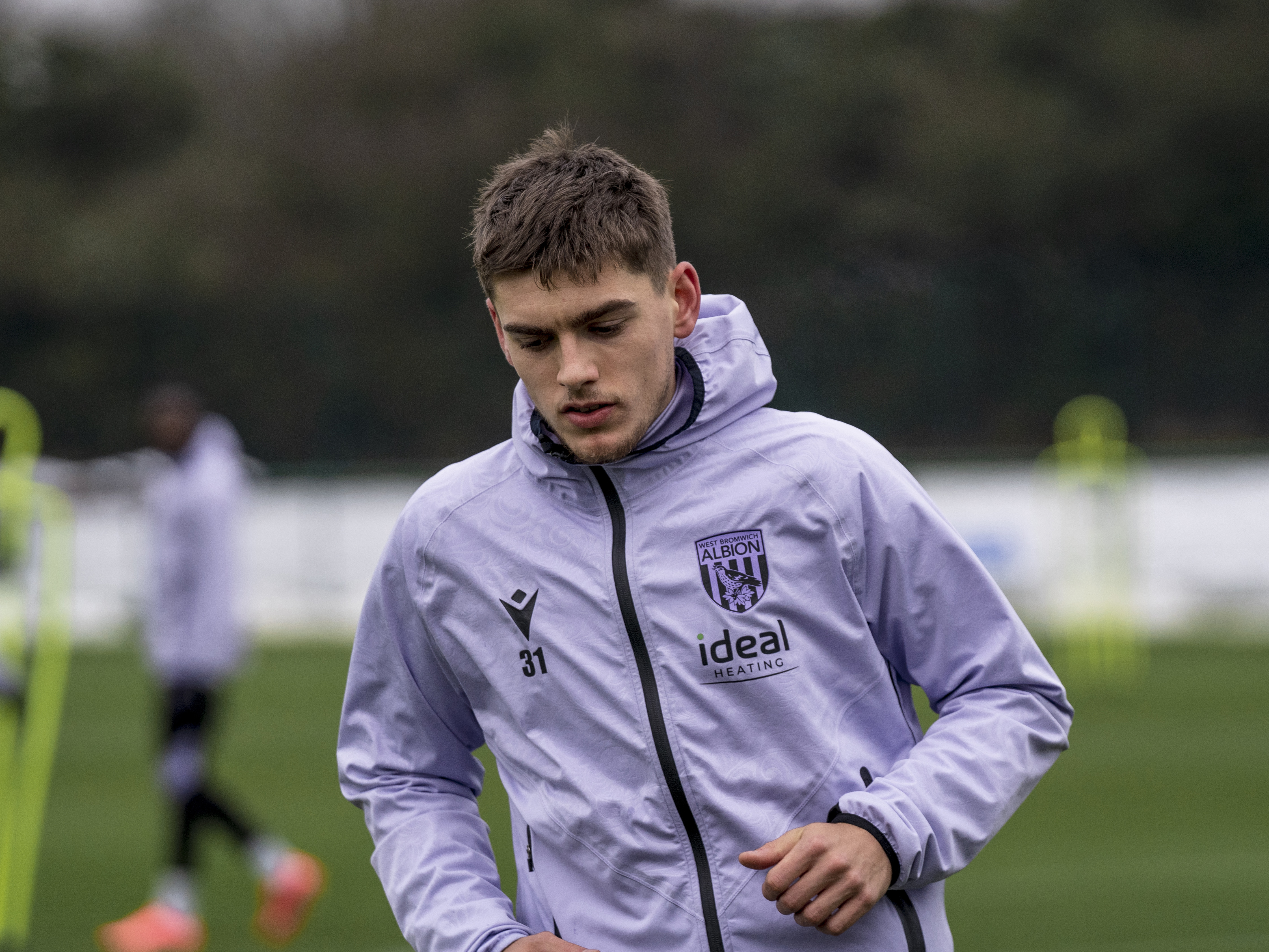 Tom Fellows running during a training session