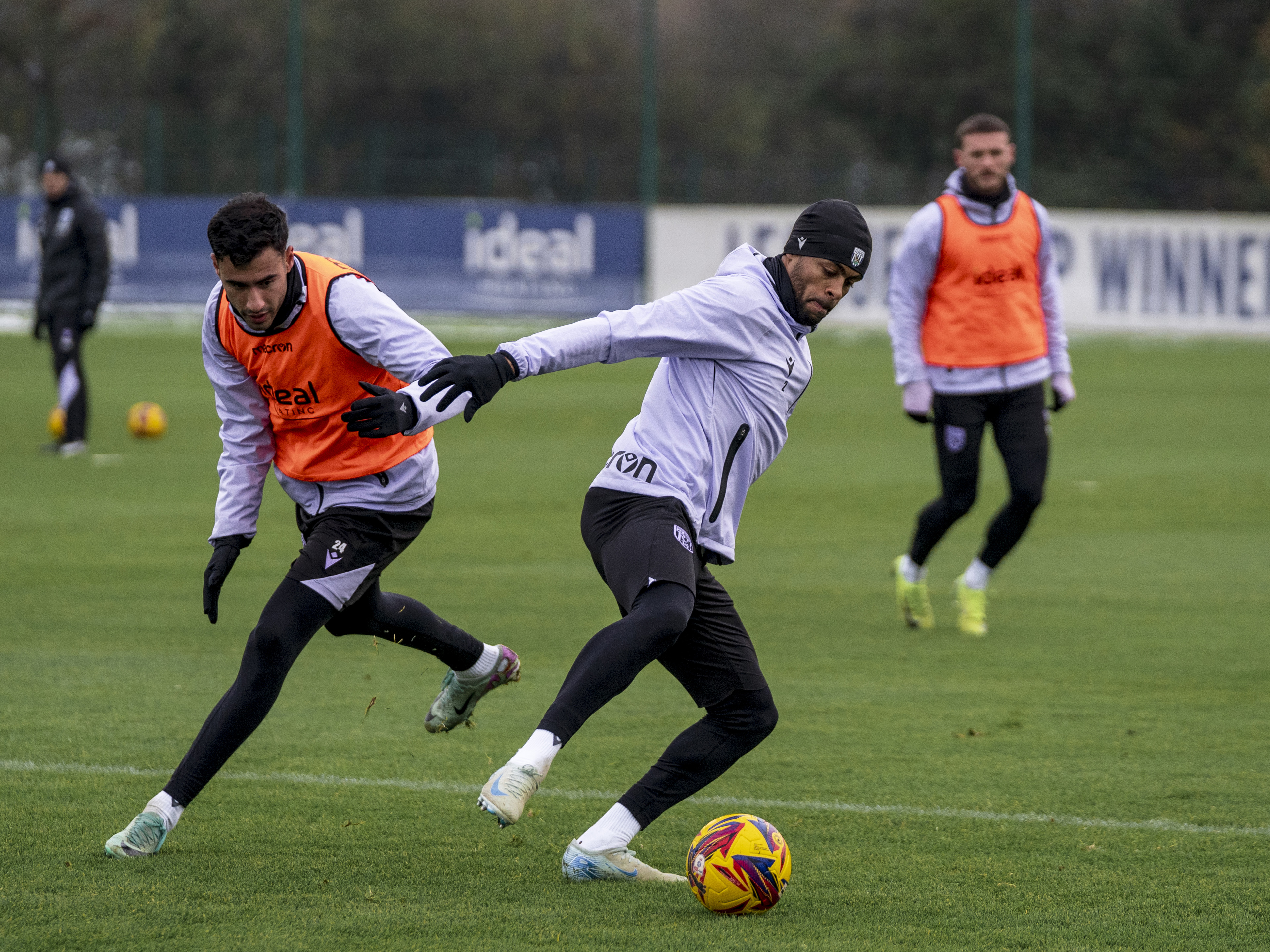 Darnell Furlong on the ball with Gianluca Frabotta on his back during a training session