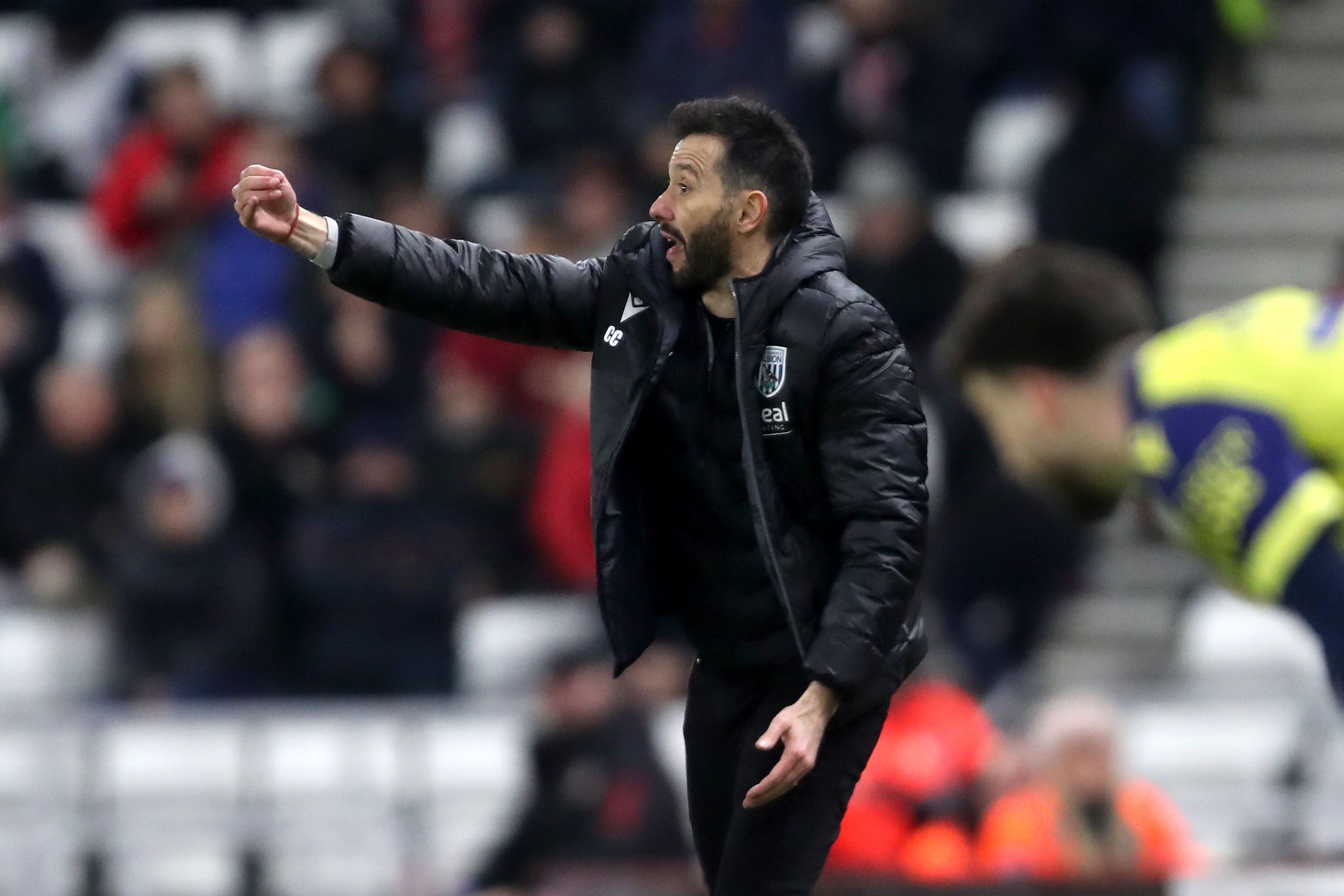 Carlos Corberán on the sidelines at the Stadium of Light directing his players 