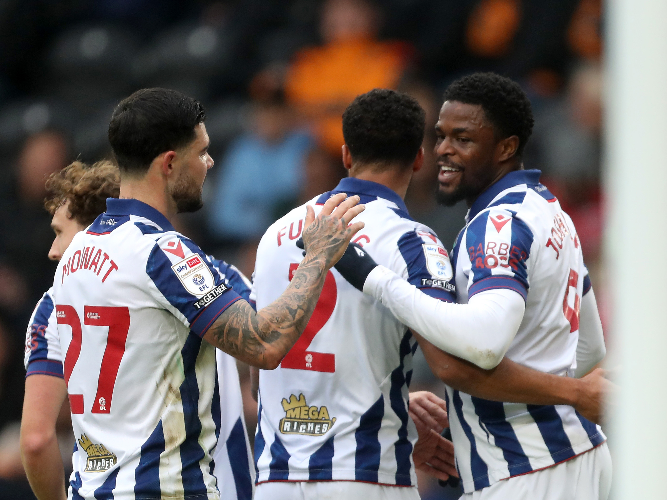 Josh Maja celebrates with team-mates after scoring at Hull City 