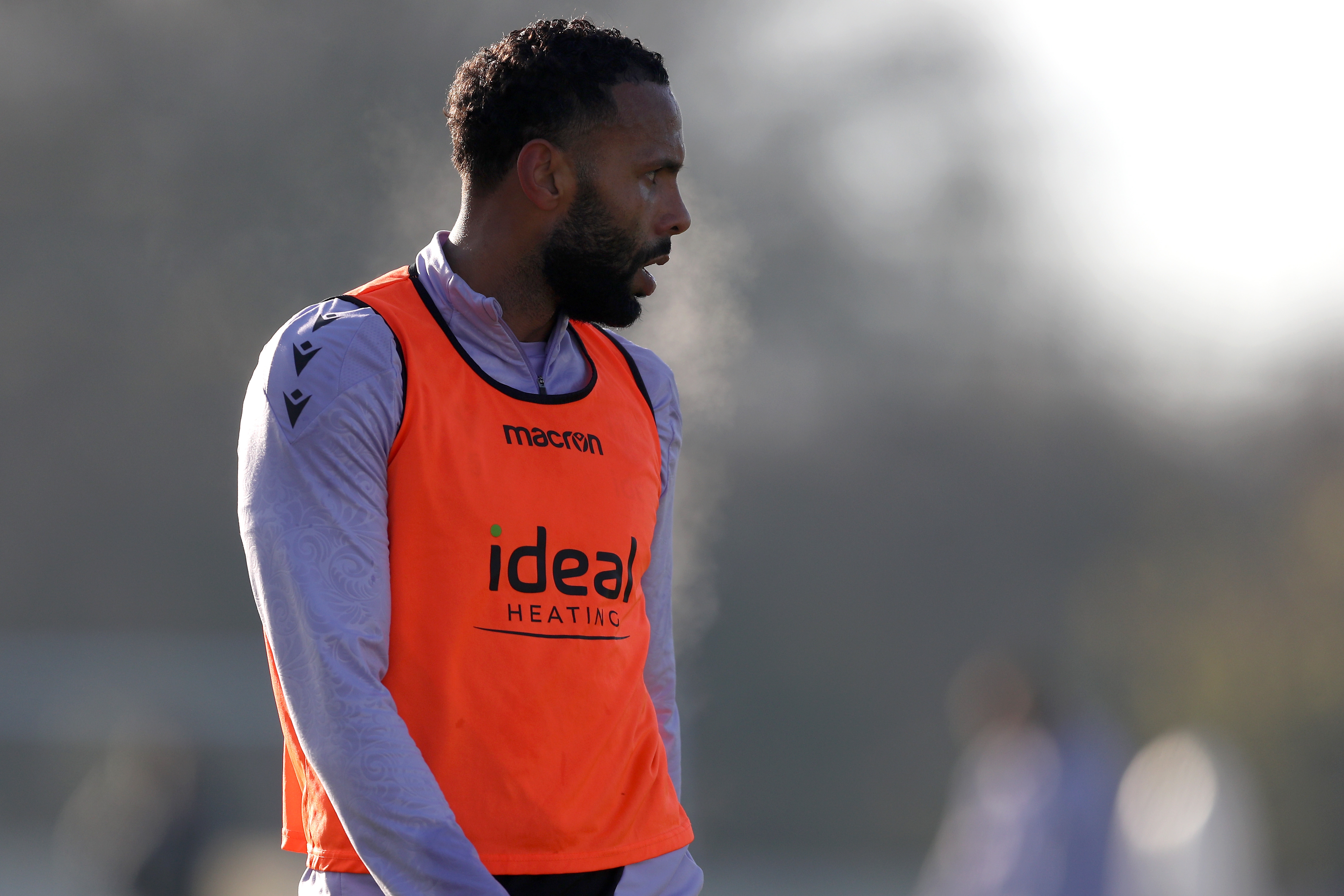 Kyle Bartley wearing an orange bib during a training session 