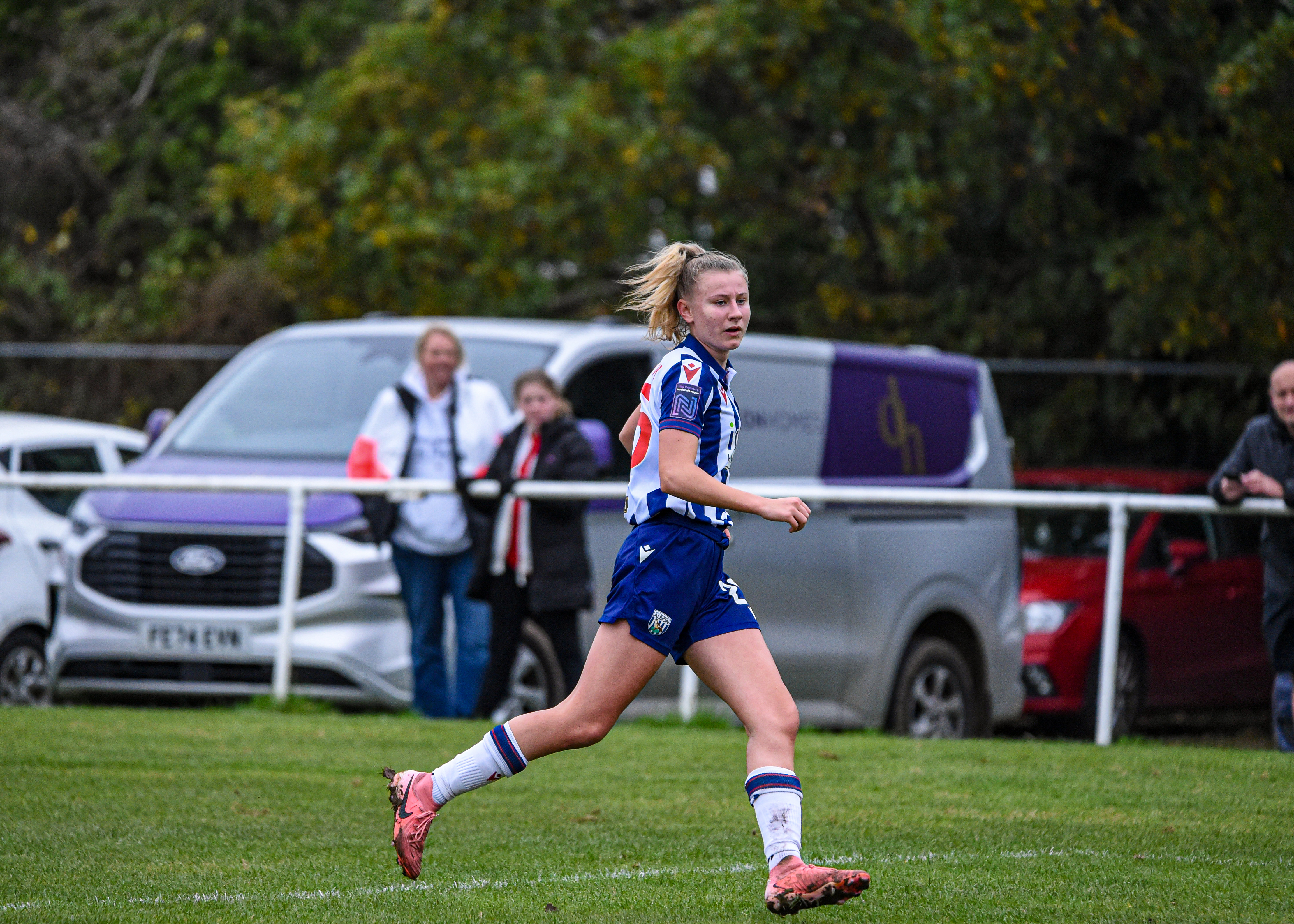 Izzie Whittick in action for Albion Women, in home colours.