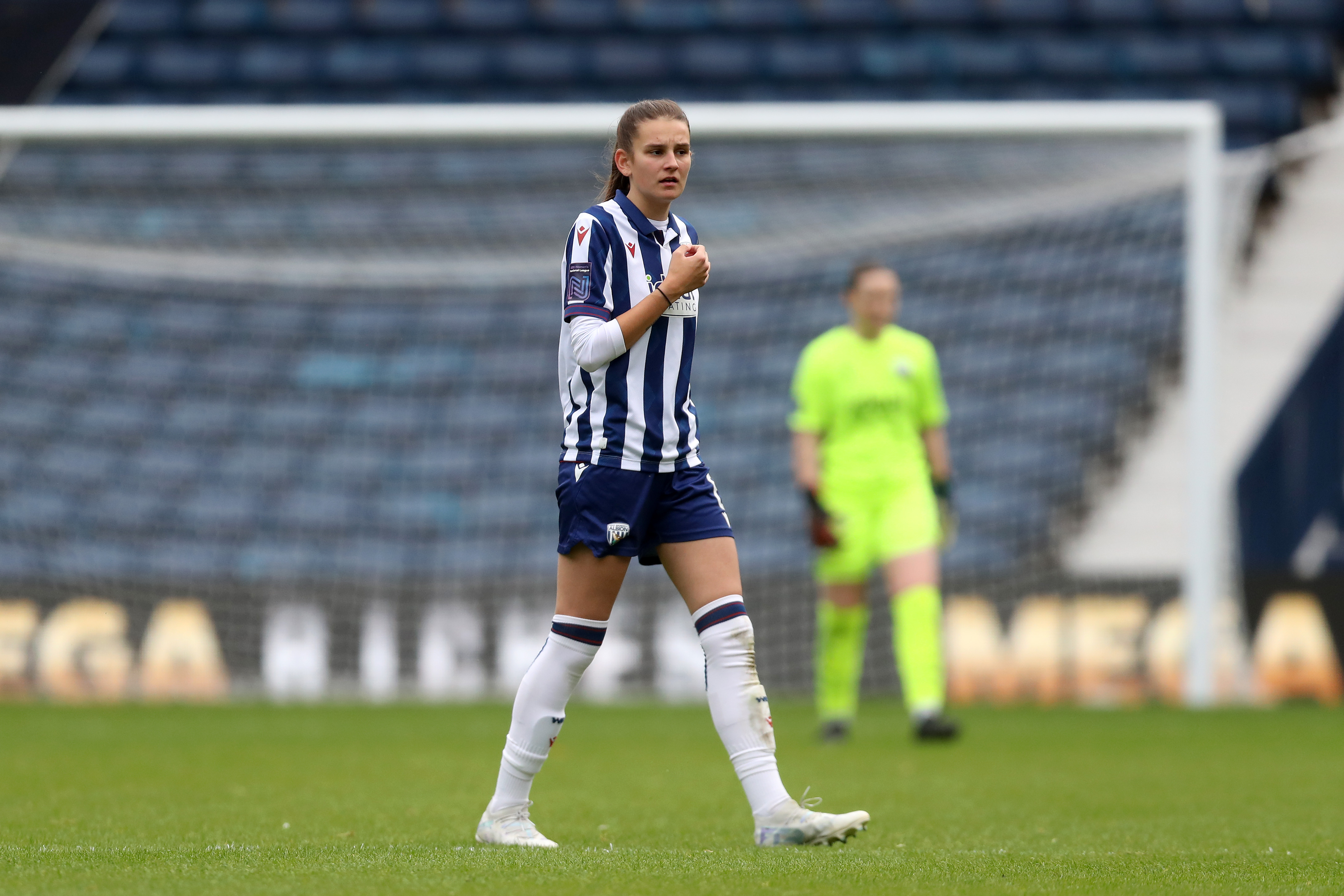 Izzy Green in action for WBA Women in the home kit