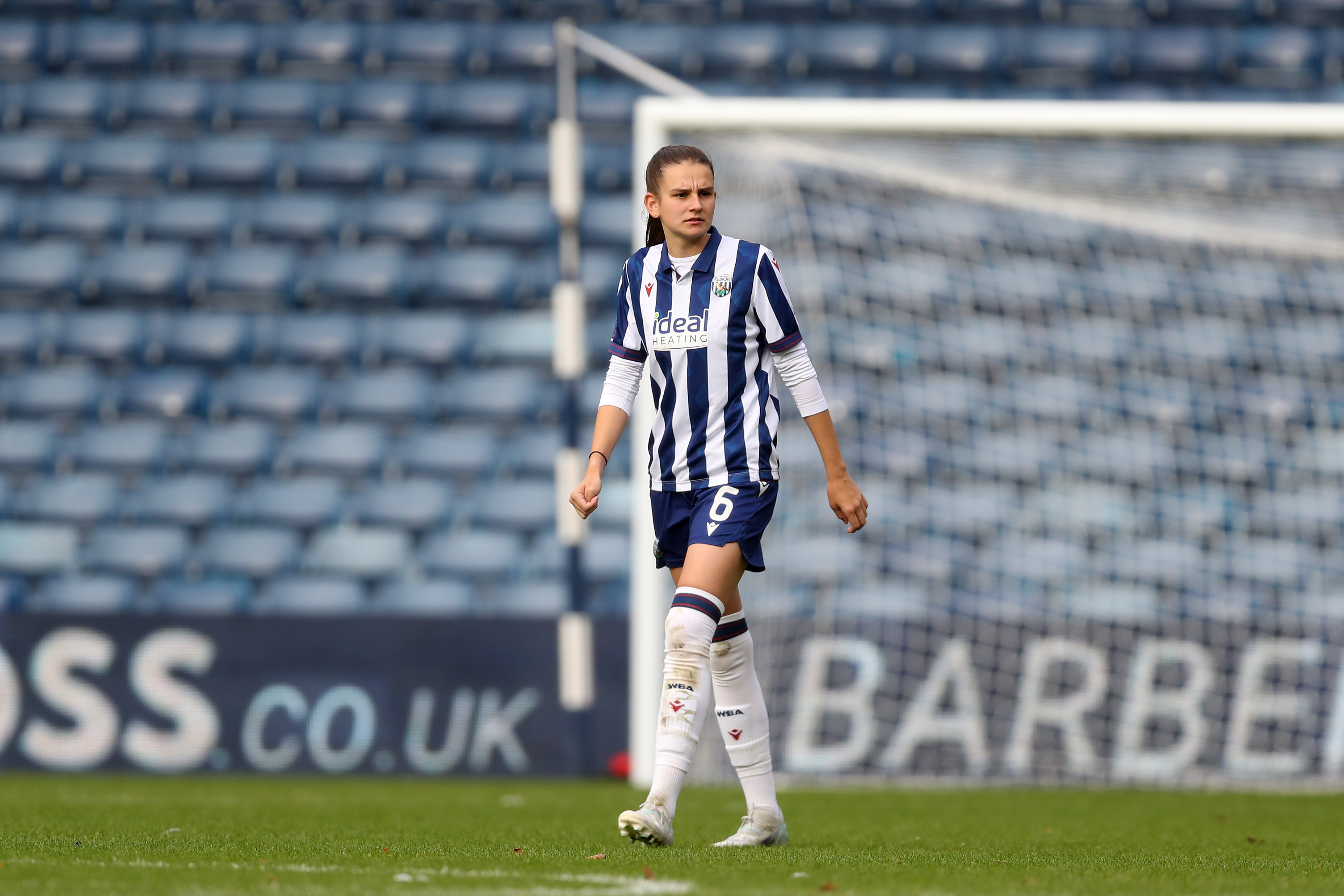 Izzy Green in action for WBA Women in the home kit