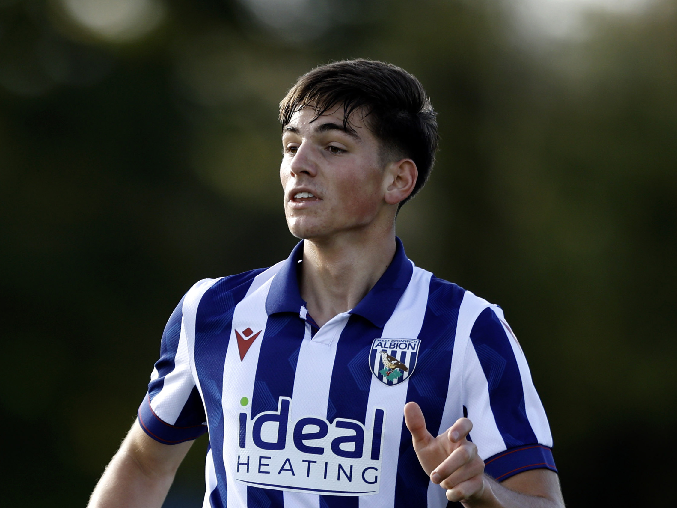 Charlie Blackshields in action for Albion's U18 side in the home kit 