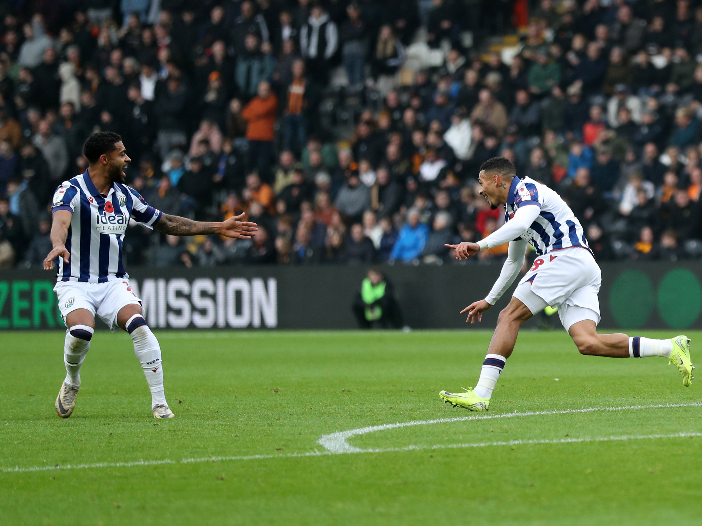 An image of Karlan Grant and Darnell Furlong celebrating a goal against Hull