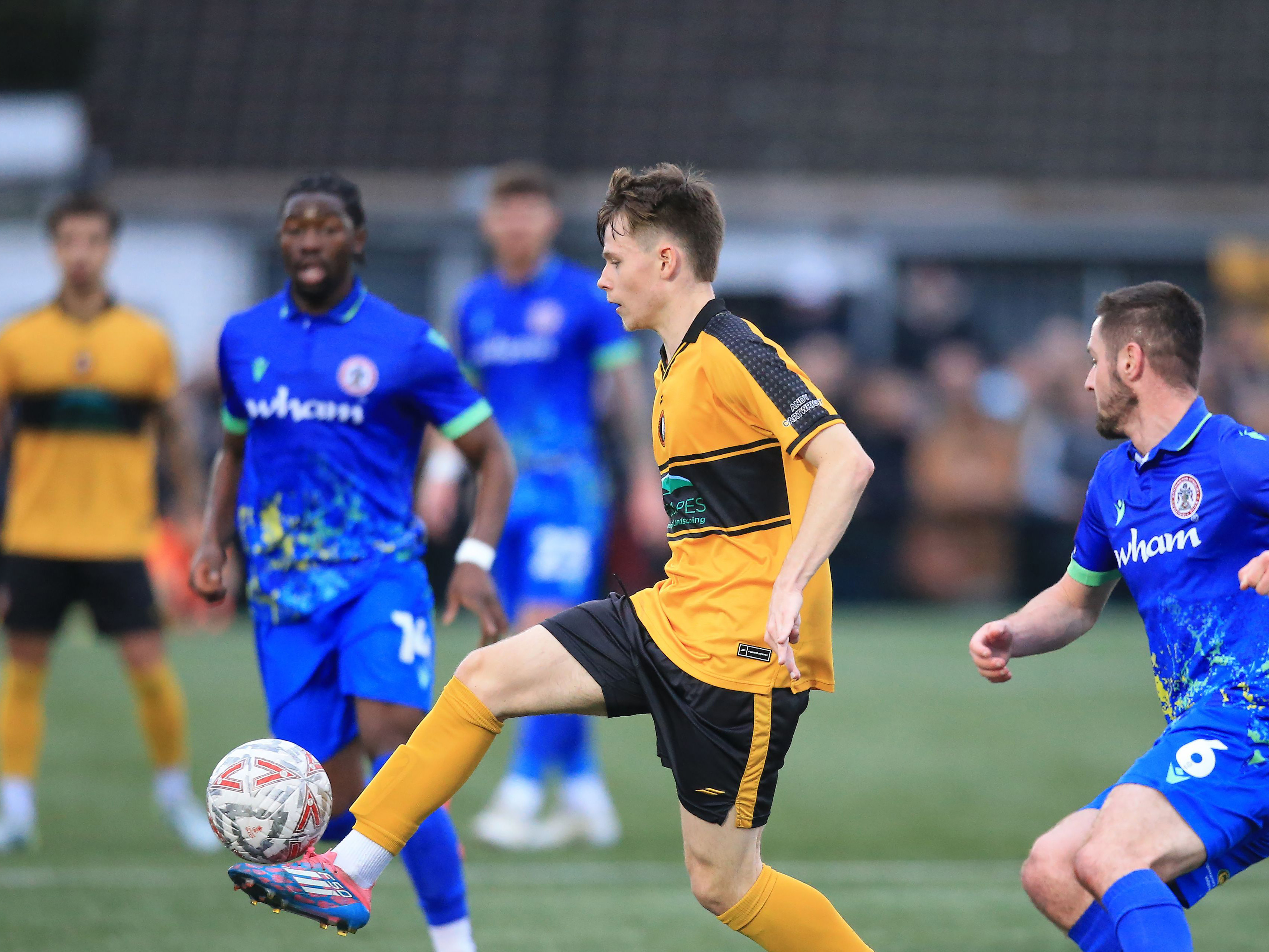 Fenton Heard in action for Rushall Olympic in their home kit 