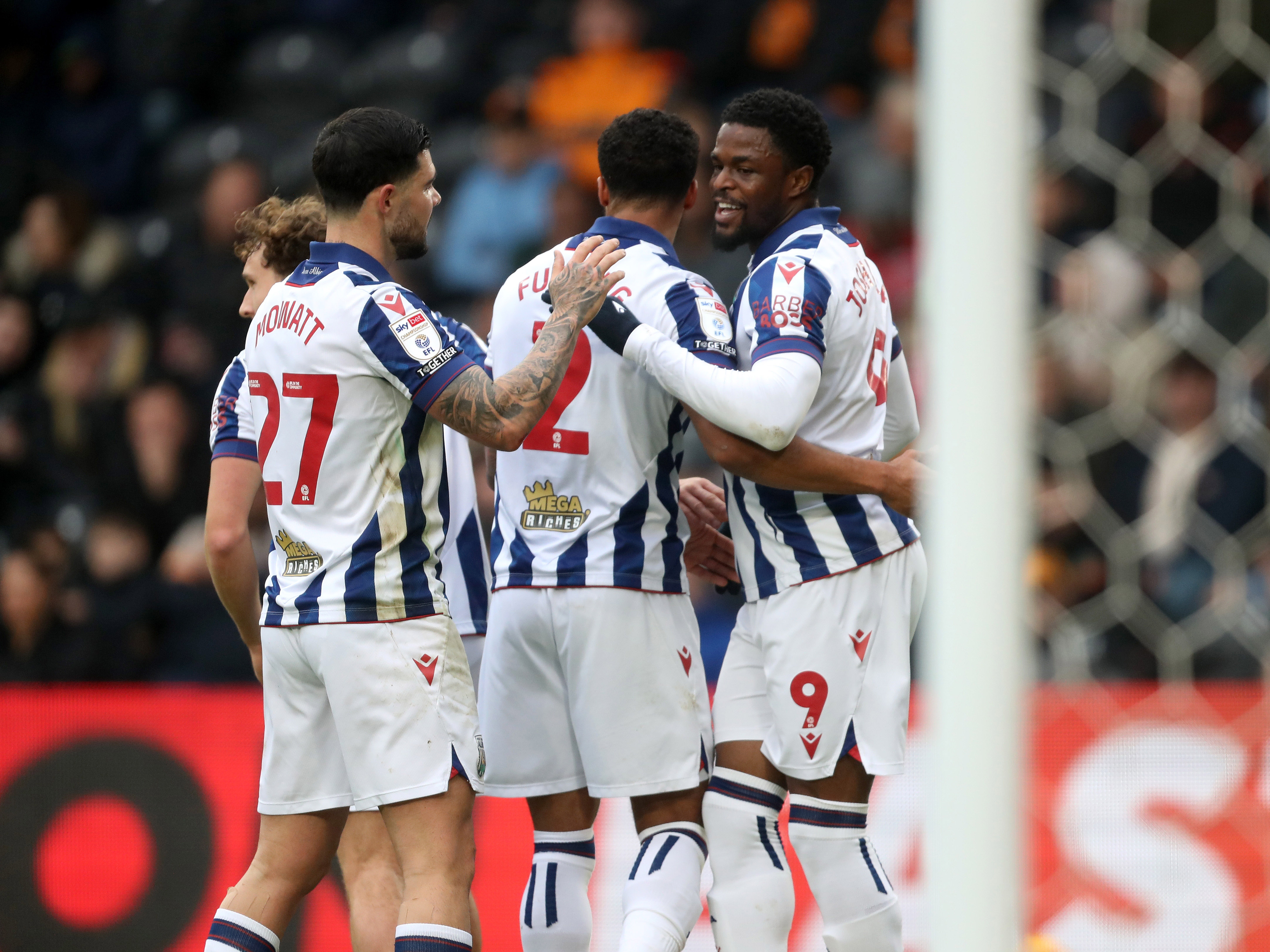 An image of Josh Maja celebrating with his teammates after scoring at Hull