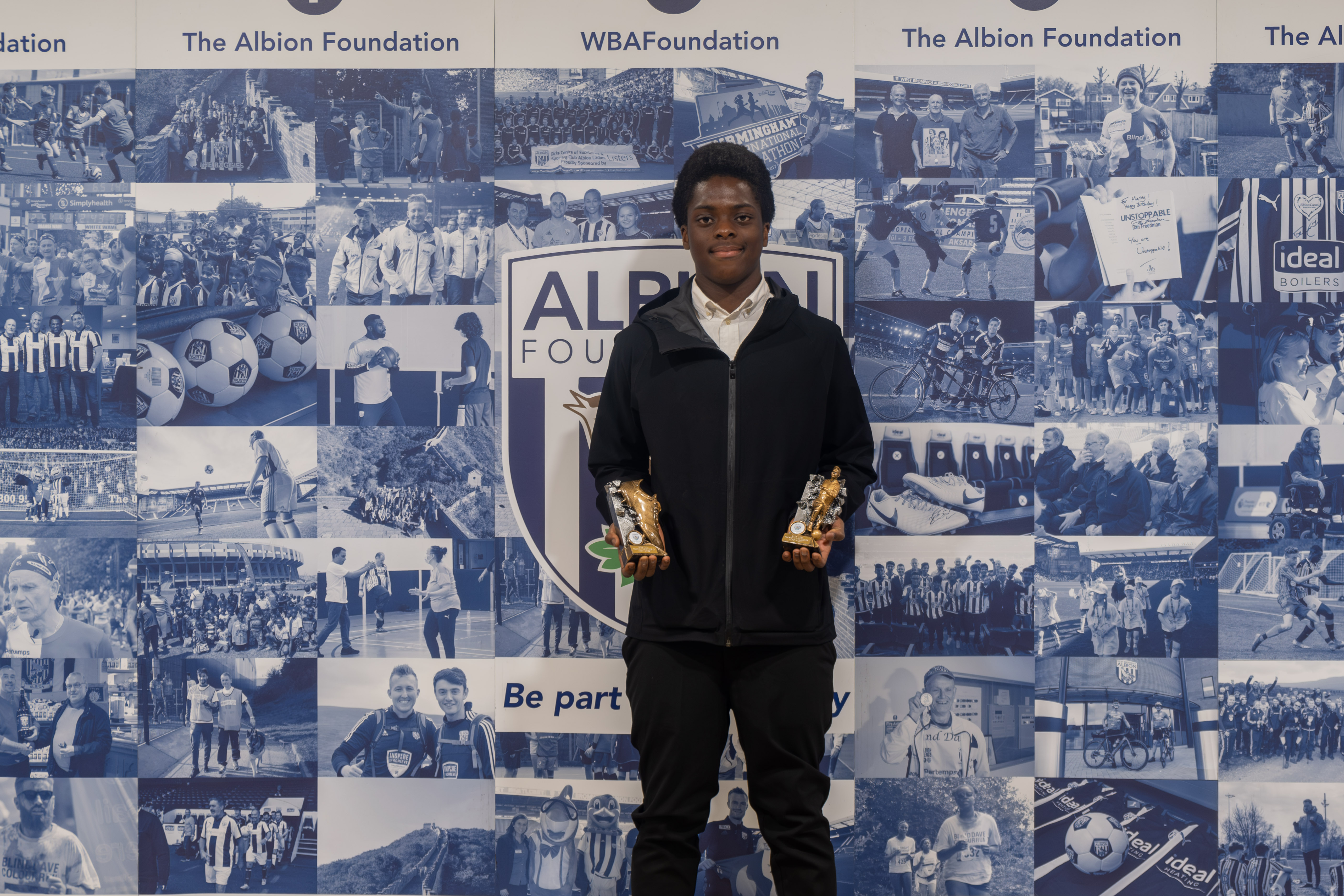 Lord collecting his ‘players player’ and ‘parents player’ at the MJPL awards evening June 2024