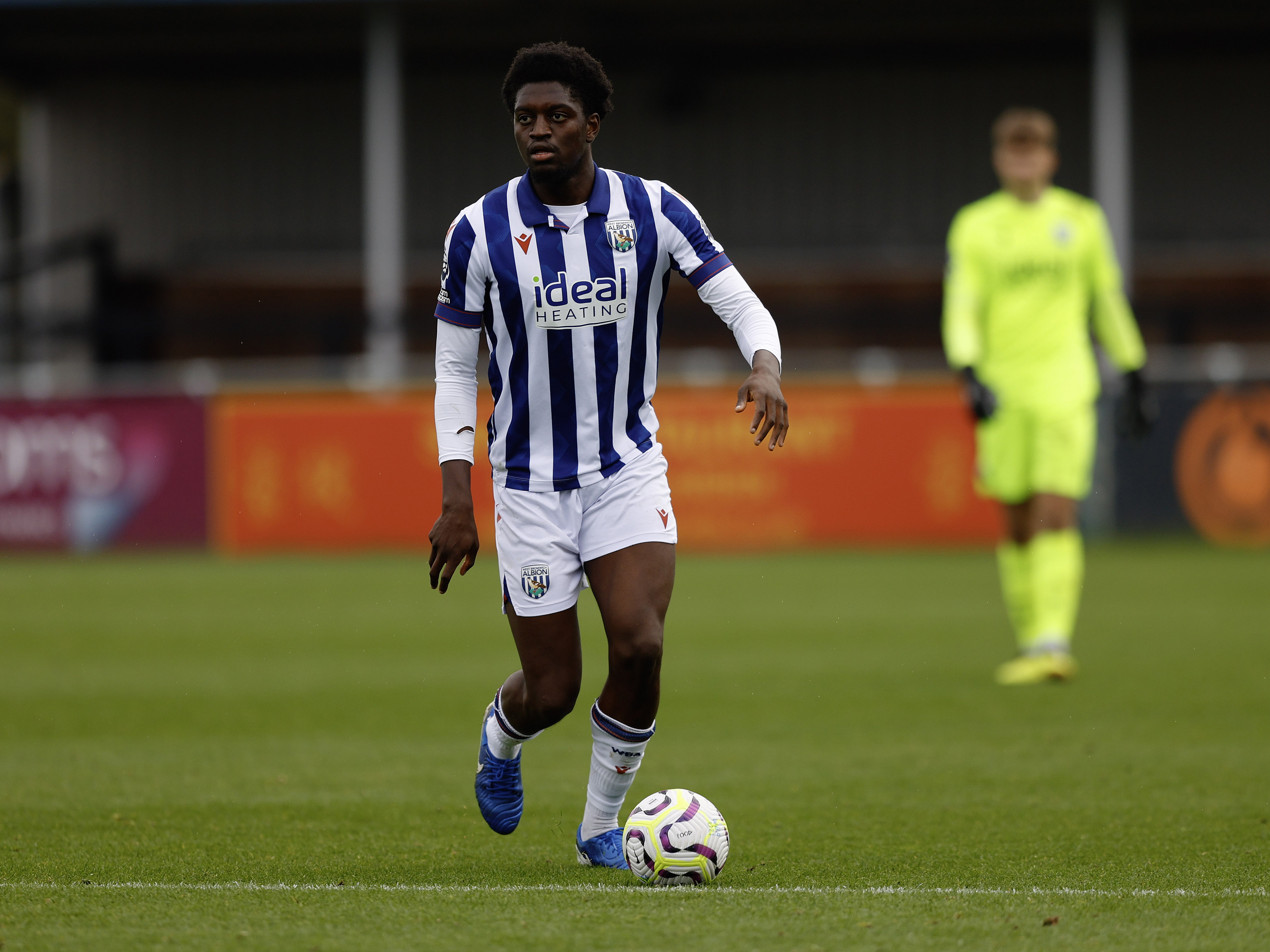 A photo of Albion U21 defender Michael Parker in the 2024/25 home kit