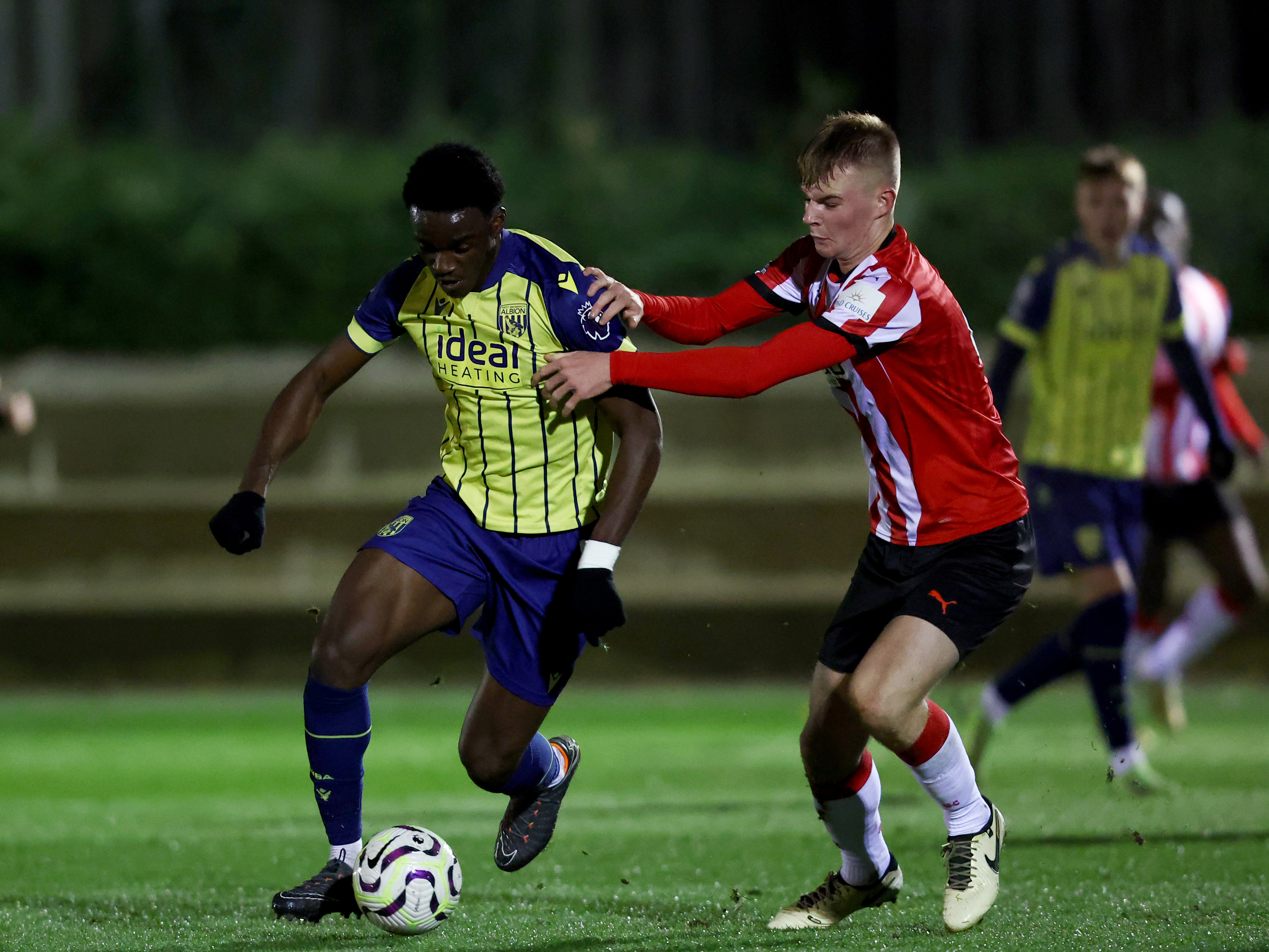 A photo of young striker Dan Chimeziri in the 2024/25 yellow away kit