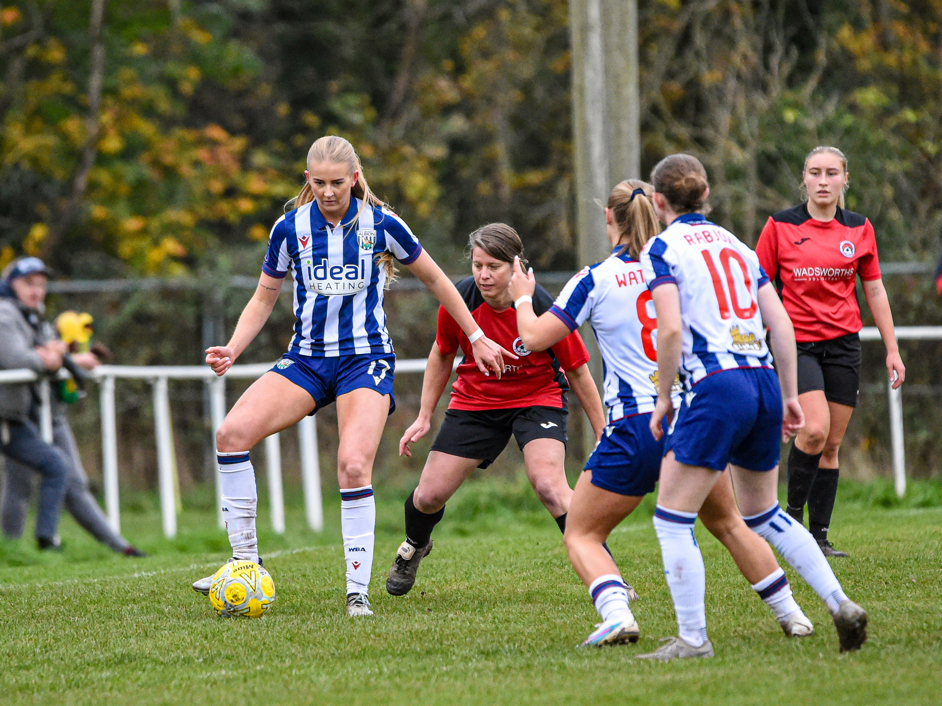 Rhianne Oakley on the ball in the home kit during the FA Cup game with Knowle Ladies