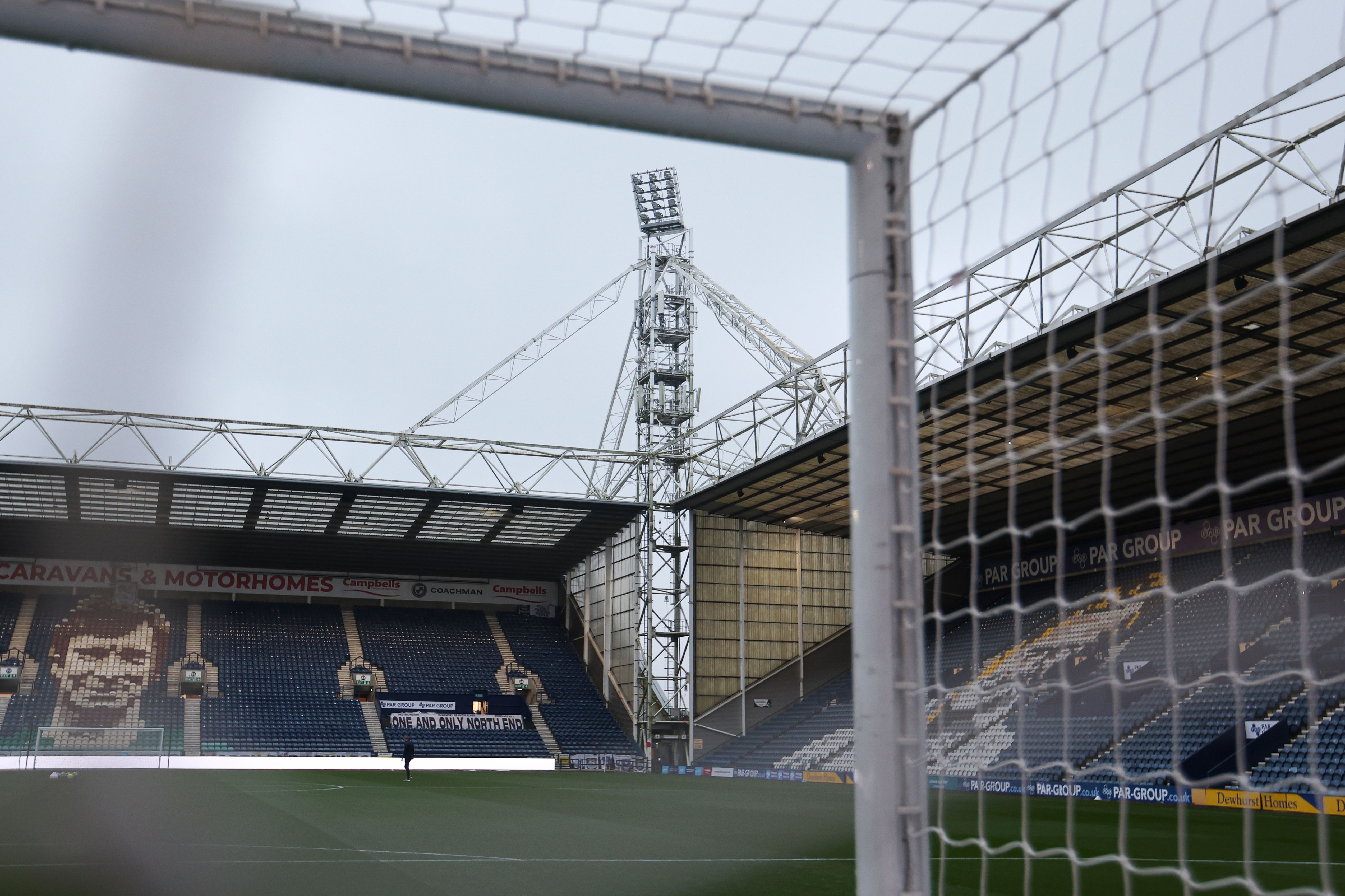 A general view of inside the stadium at Deepdale through a goal net 