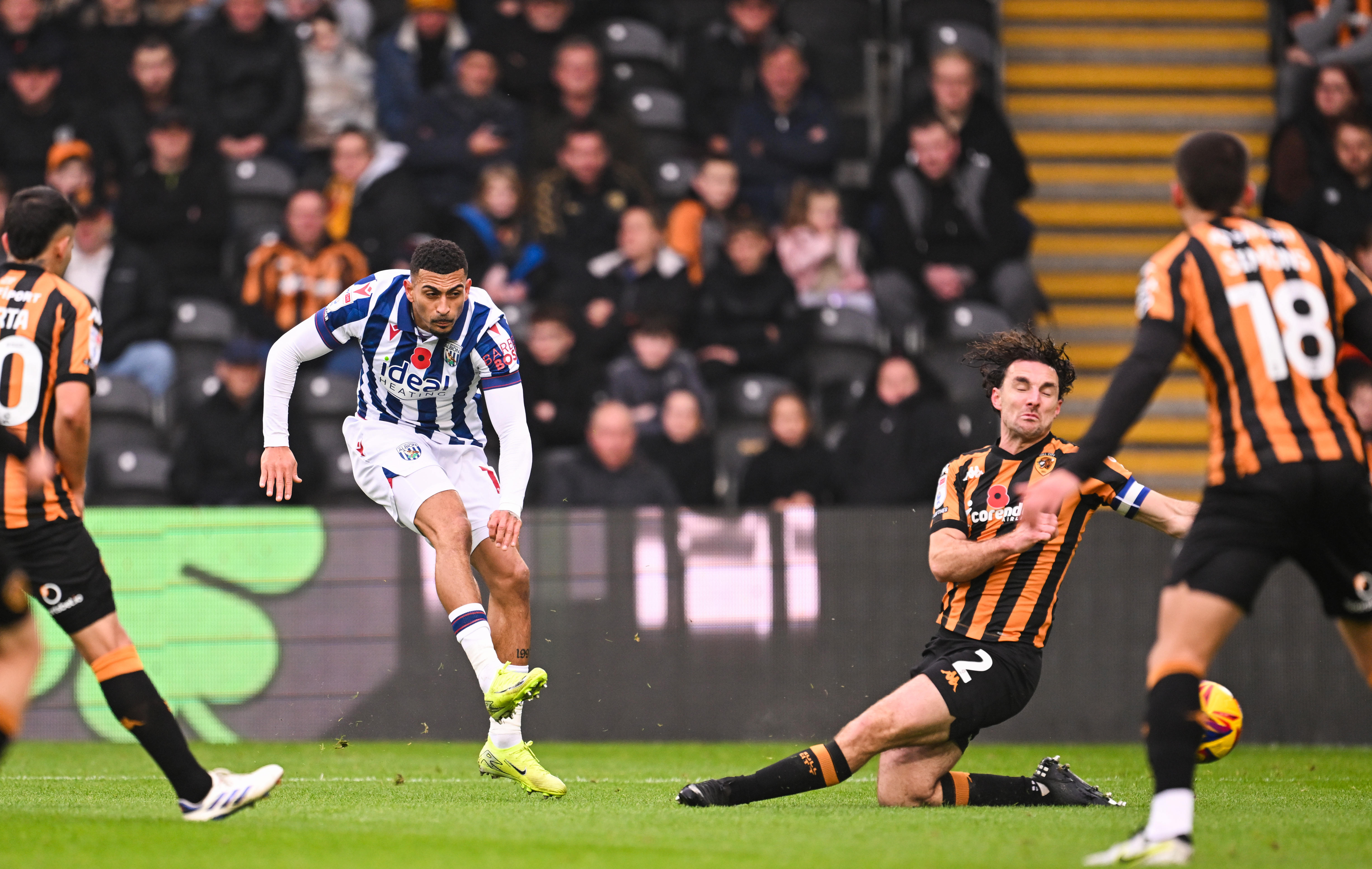 Karlan Grant shoots at goal against Hull City