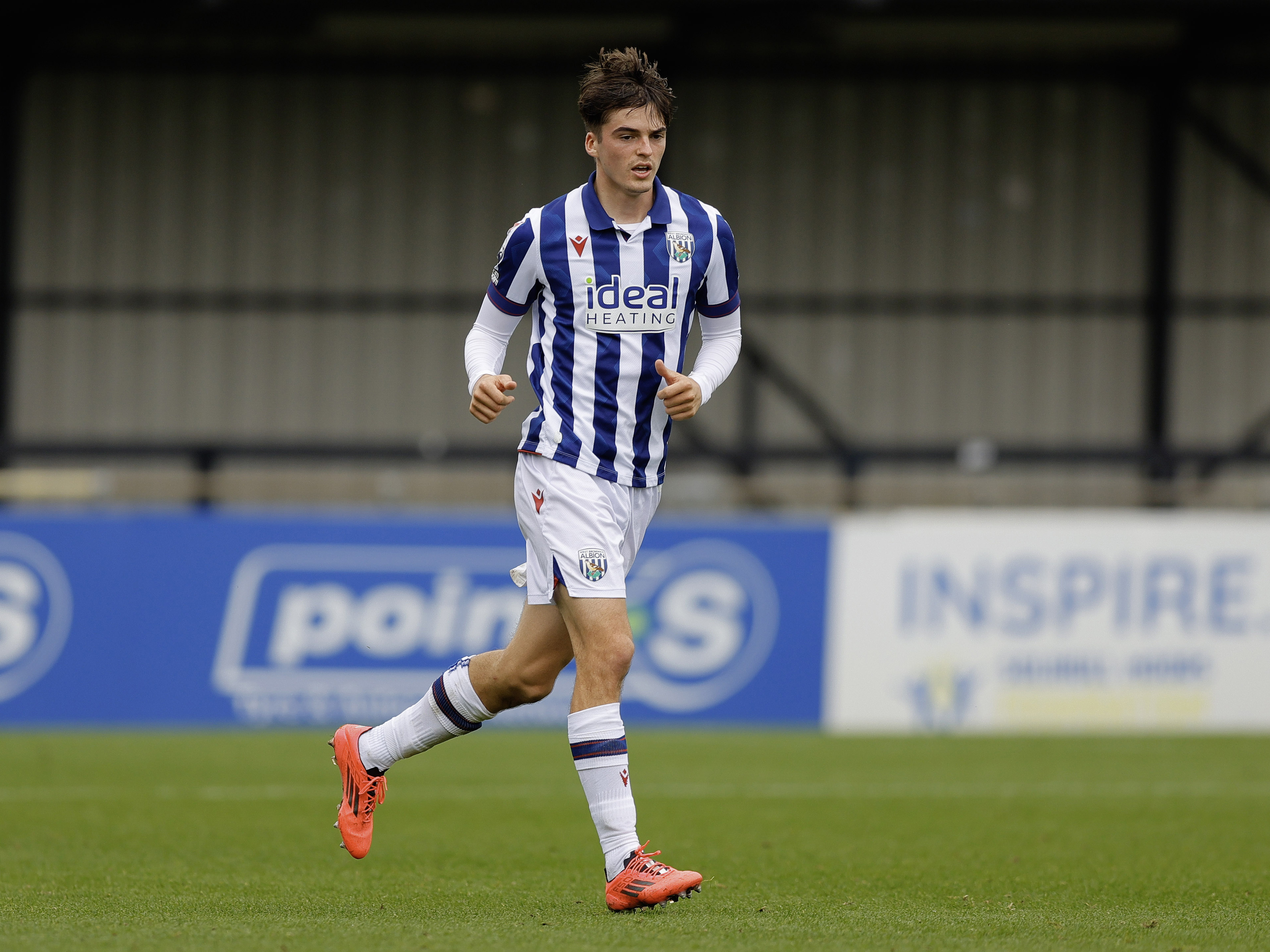 A photo of Albion U21 defender Alex Williams in the 2024/25 home kit