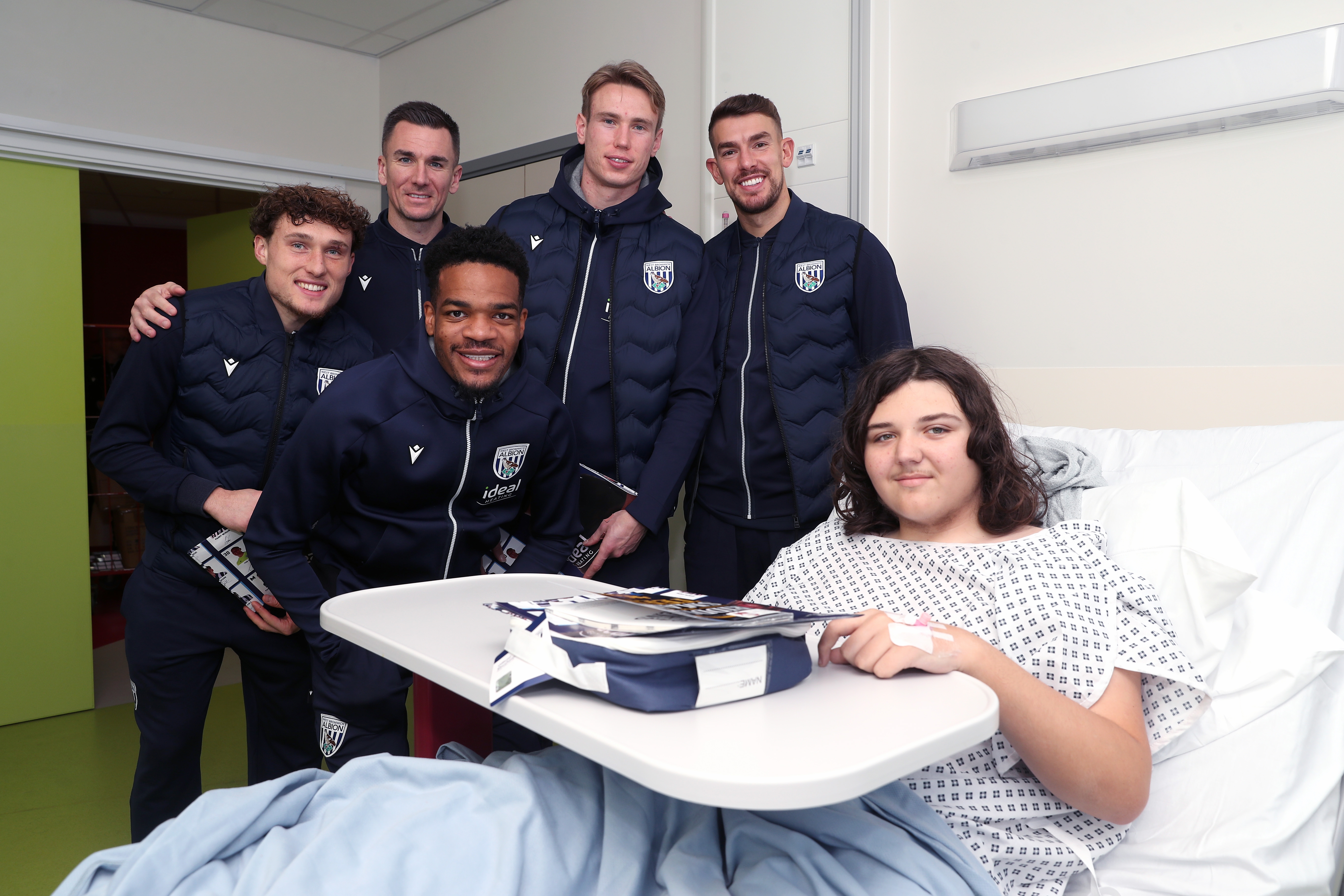 Albion players pose for a photo with a young patient at Midlands Metropolitan University Hospital 