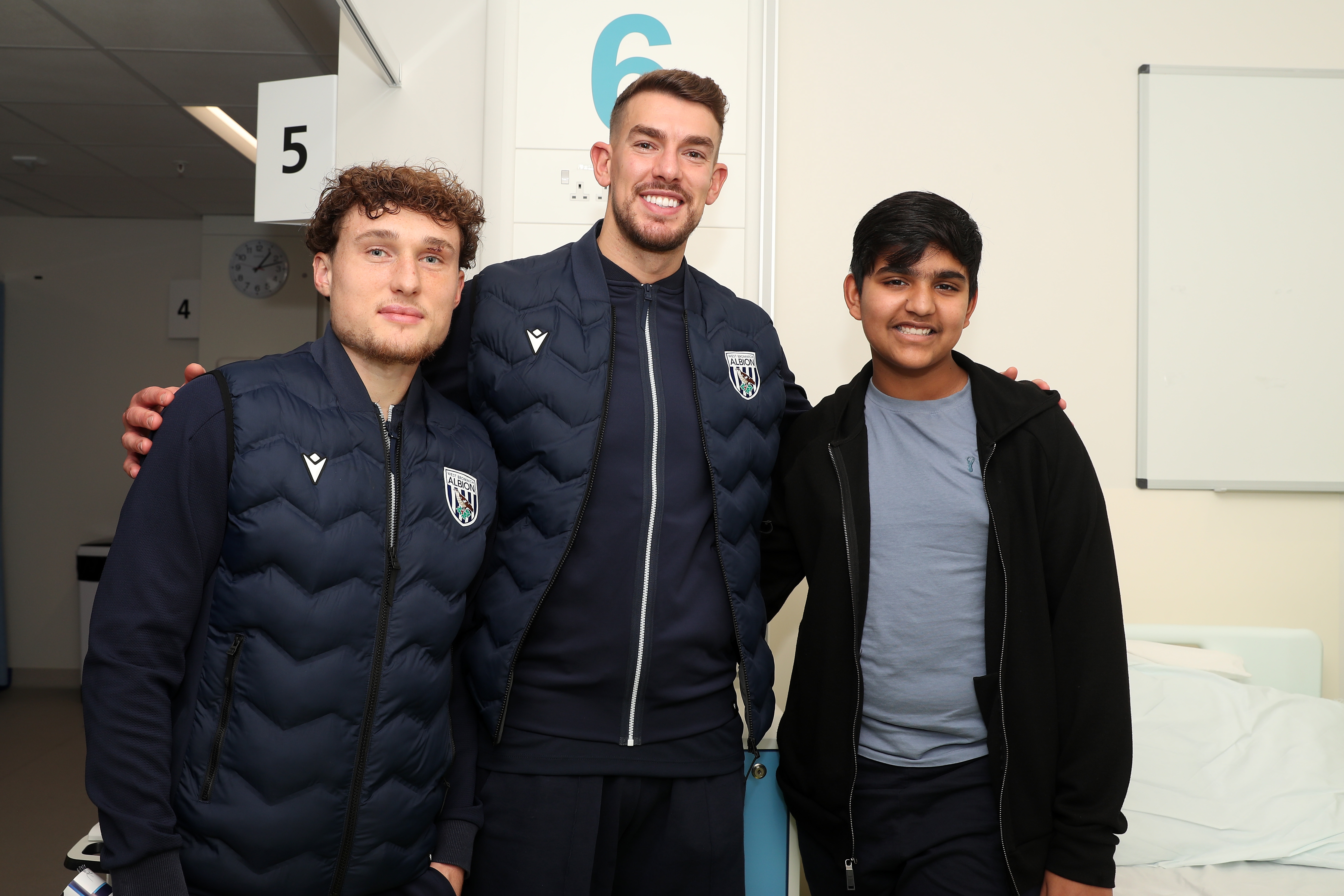 Albion players pose for a photo with a young patient at Midlands Metropolitan University Hospital 