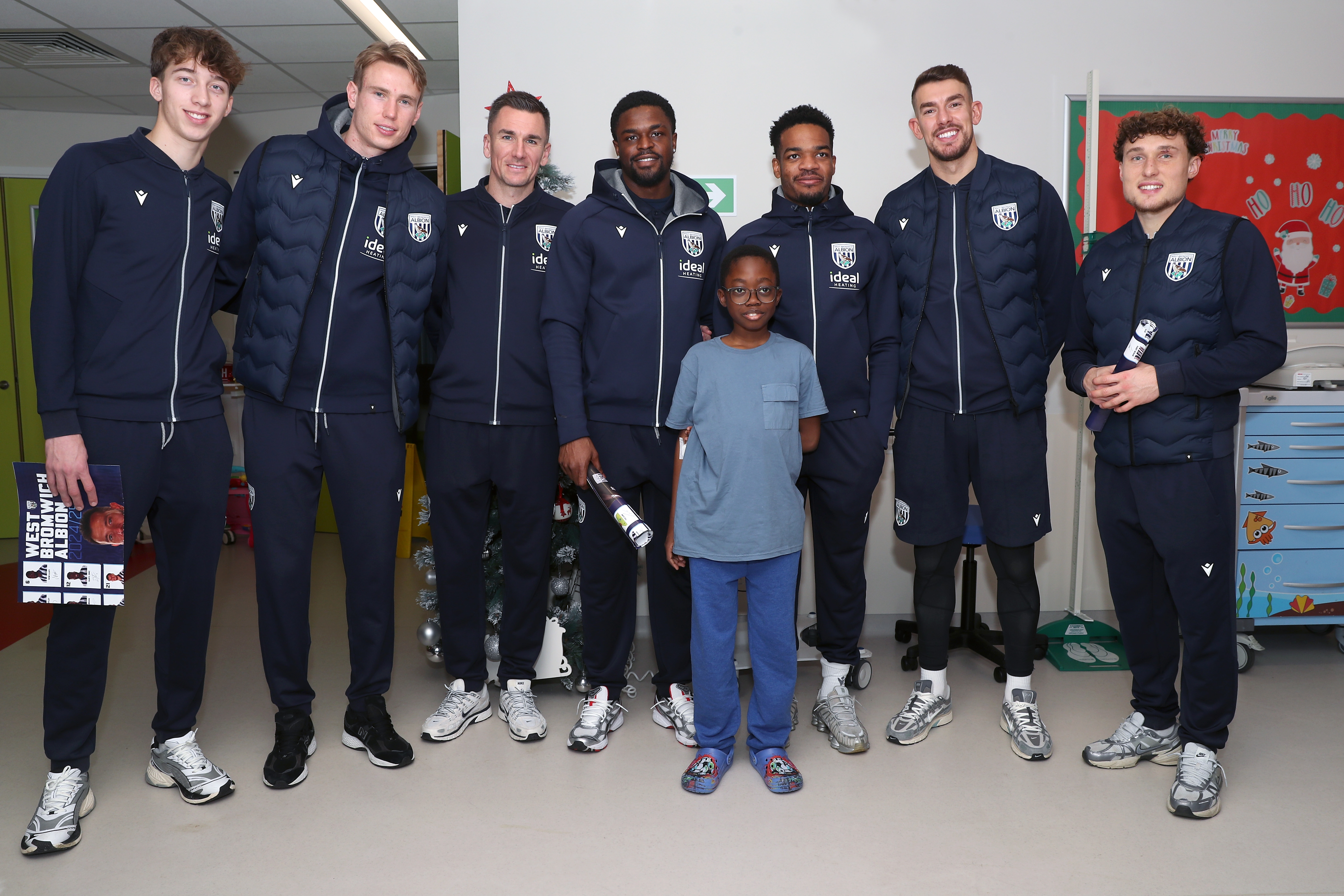 Albion players pose for a photo with a young patient at Midlands Metropolitan University Hospital 