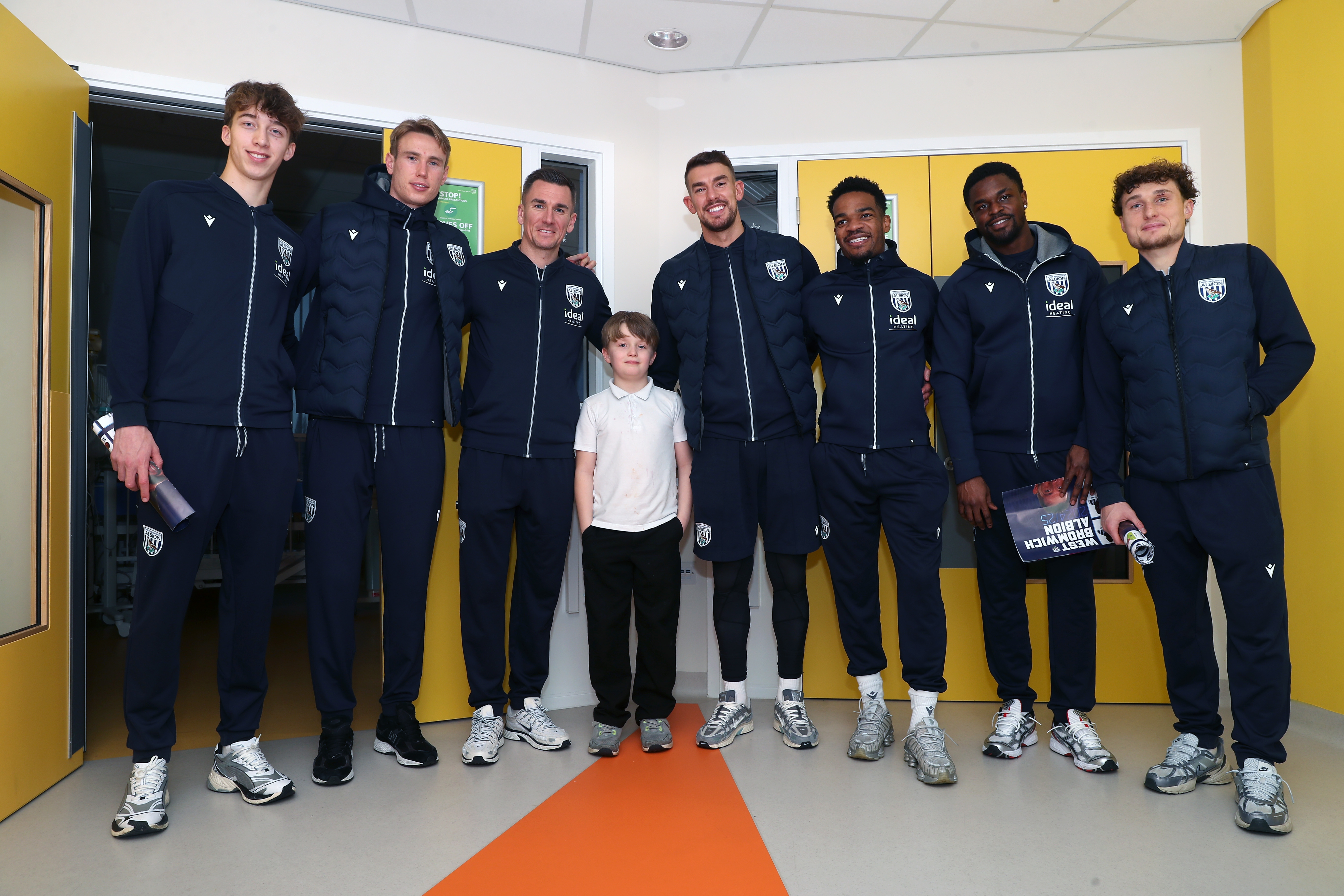 Albion players pose for a photo with a young patient at Midlands Metropolitan University Hospital 