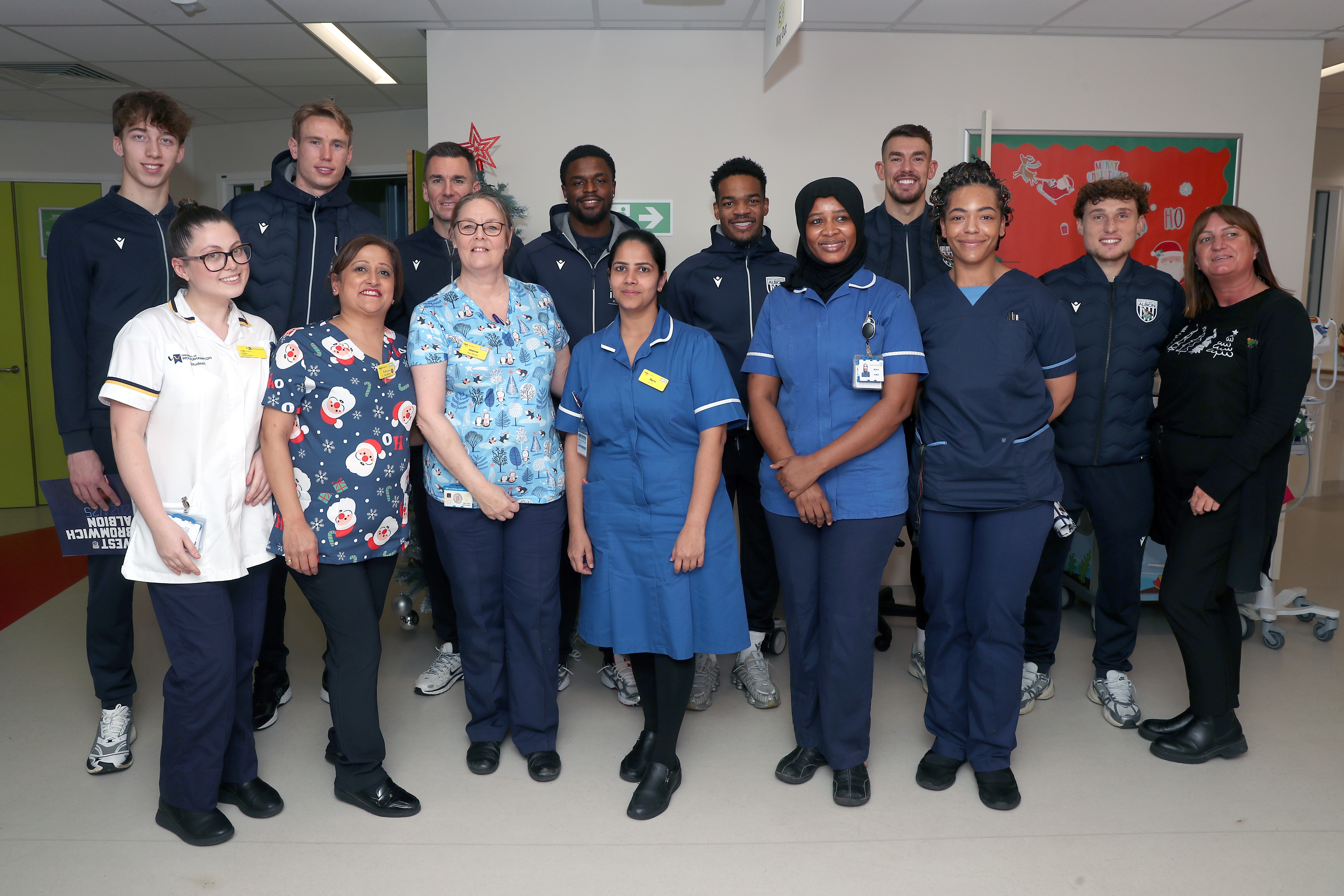 Albion players pose for a photo with NHS staff members at Midlands Metropolitan University Hospital 