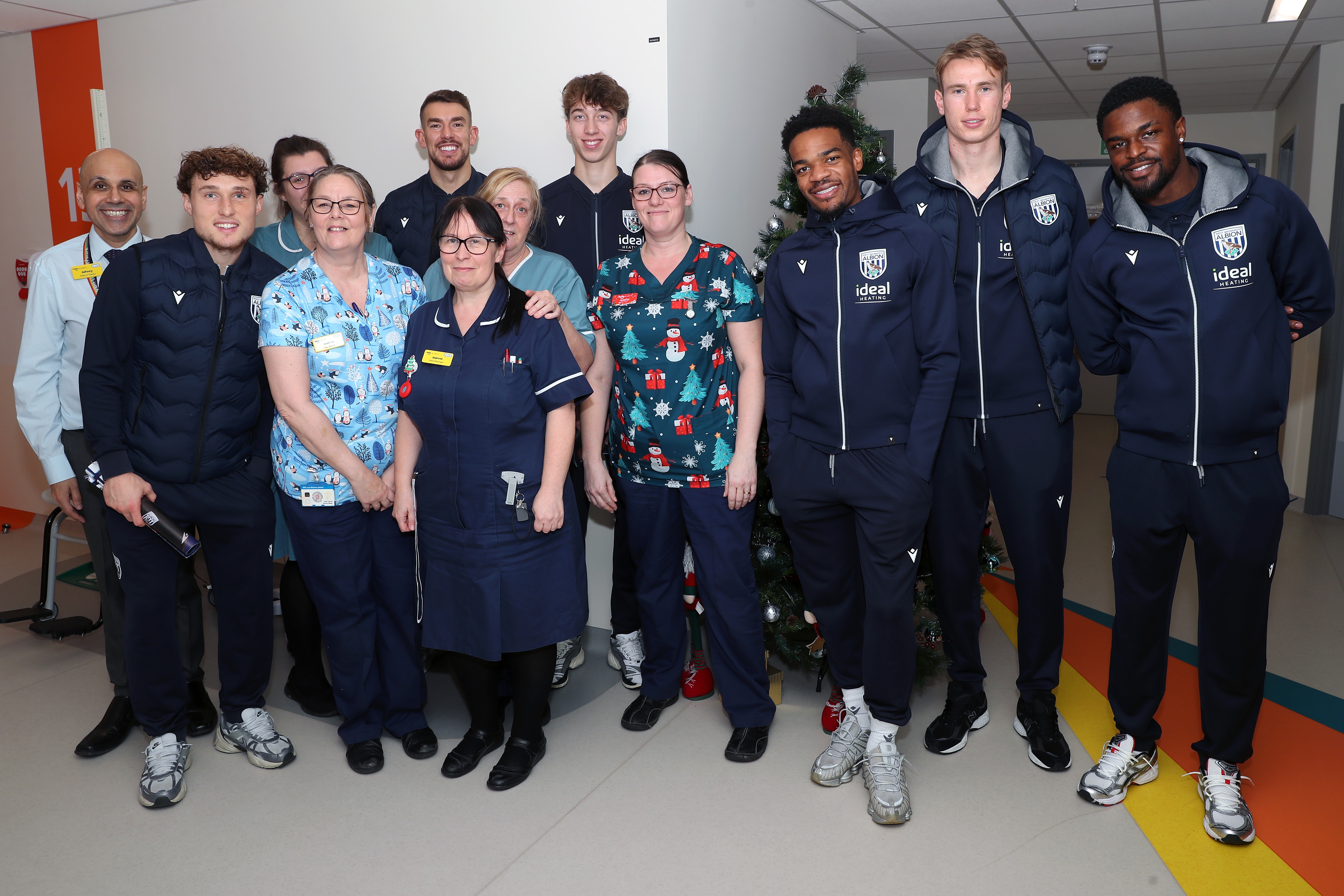 Albion players pose for a photo with NHS staff members at Midlands Metropolitan University Hospital 