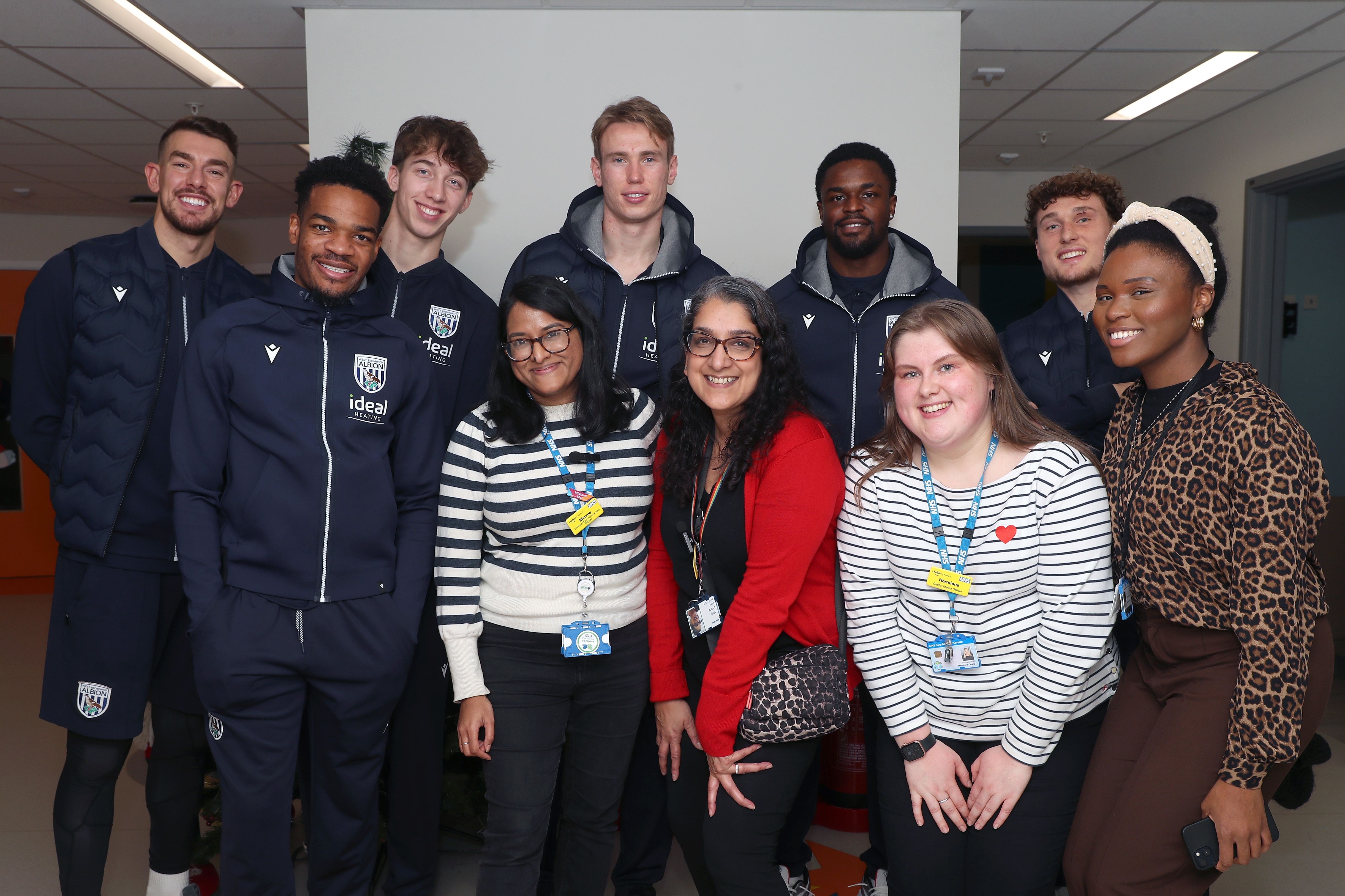 Albion players pose for a photo with NHS staff members at Midlands Metropolitan University Hospital 